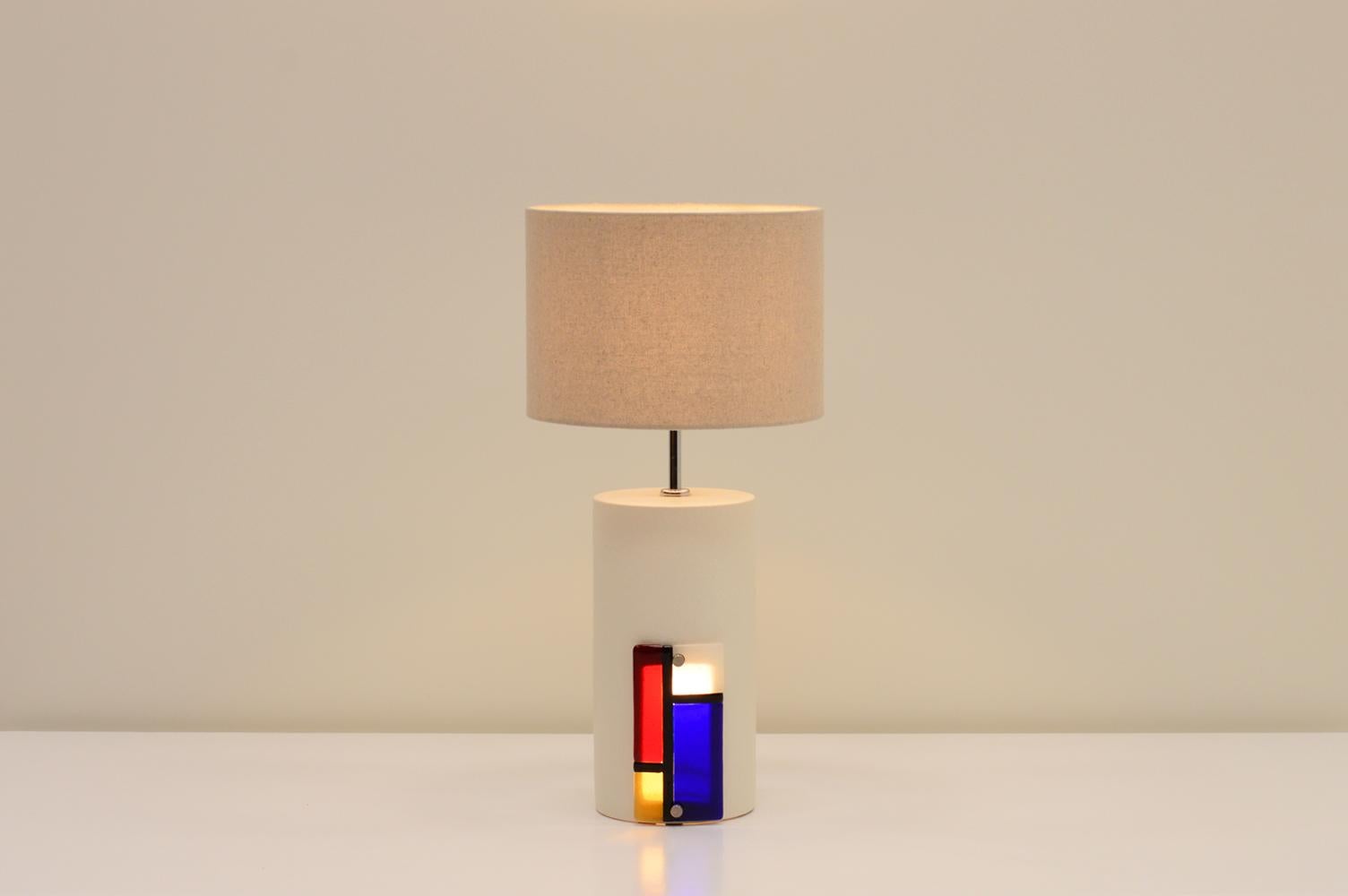 Large table lamp by Ceramics Bondia, Spain 80s. Rare ceramic table lamp with glass Mondriaan style front that lights up and canvas shade. Hand made in Valencia. The shade and glass can be switched on and off seperately. Holds an E27 bulb. The shade