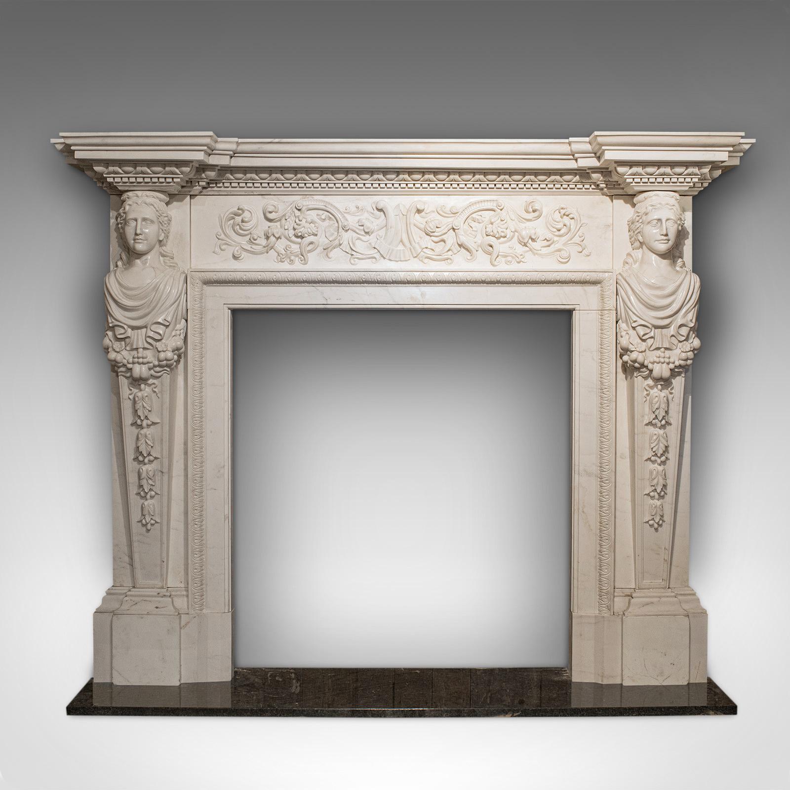 This is a large monumental fireplace. An English, Blanco marble fire surround with neoclassical taste by the renowned Devonshire sculptural artist, Dominic Hurley.

Truly impressive proportions of 7.15' x 5.74' (218cm x 175cm)
In the finest