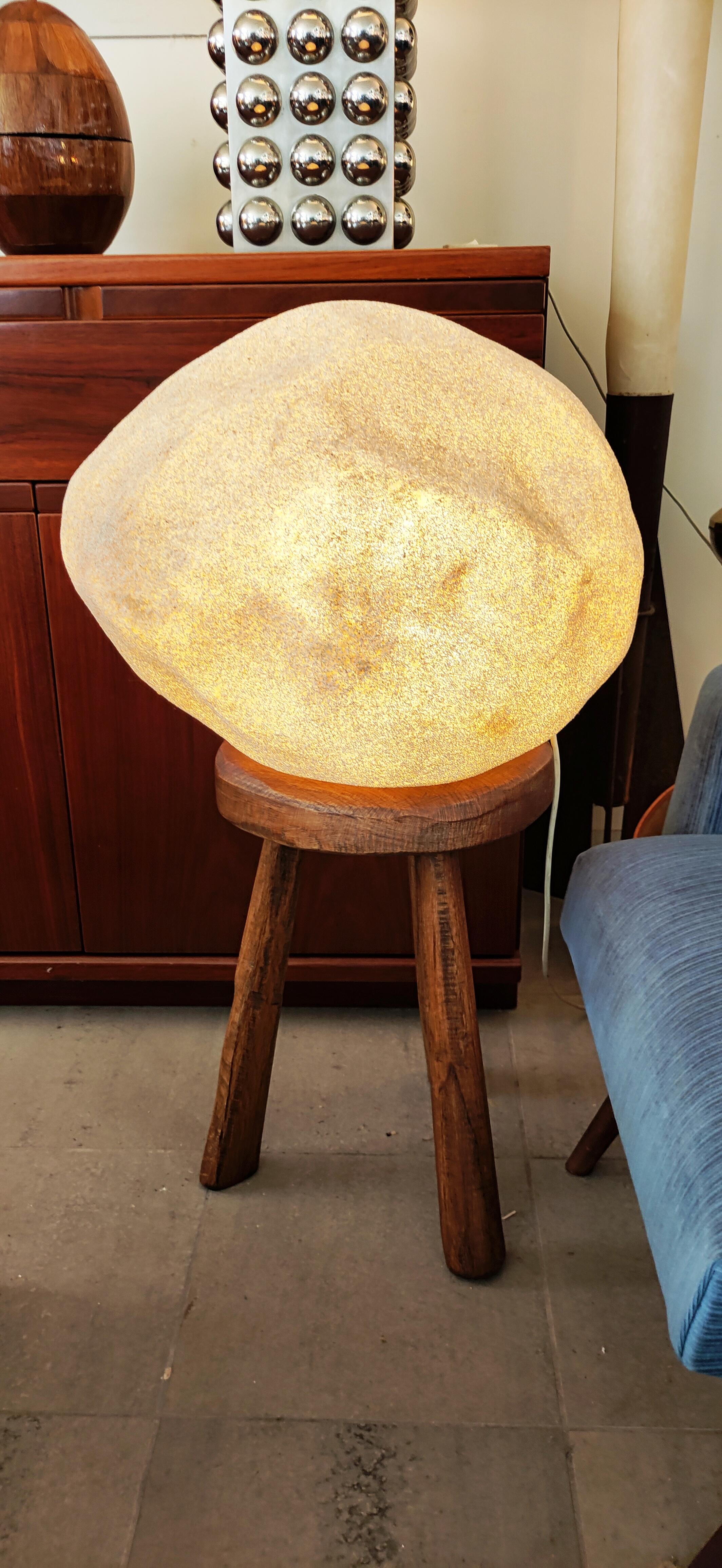 A hard-to-find oversized Moon Rock lamp designed by André Cazenave for Singleton, Italy, 1970s

Created from polyester resin and marble powder the lights create a beautifully atmospheric glow that is reminiscent of the moon. Each was hand-finished