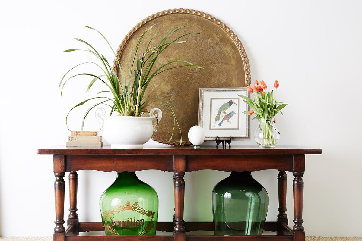 Matching pair of large Moroccan brass tray table tops featuring a thick pie crust scalloped edge. Intricately decorated with Persian style vine and foliate designs. Excellent for wall display or with modern bases for tables and ottoman. 2 available,