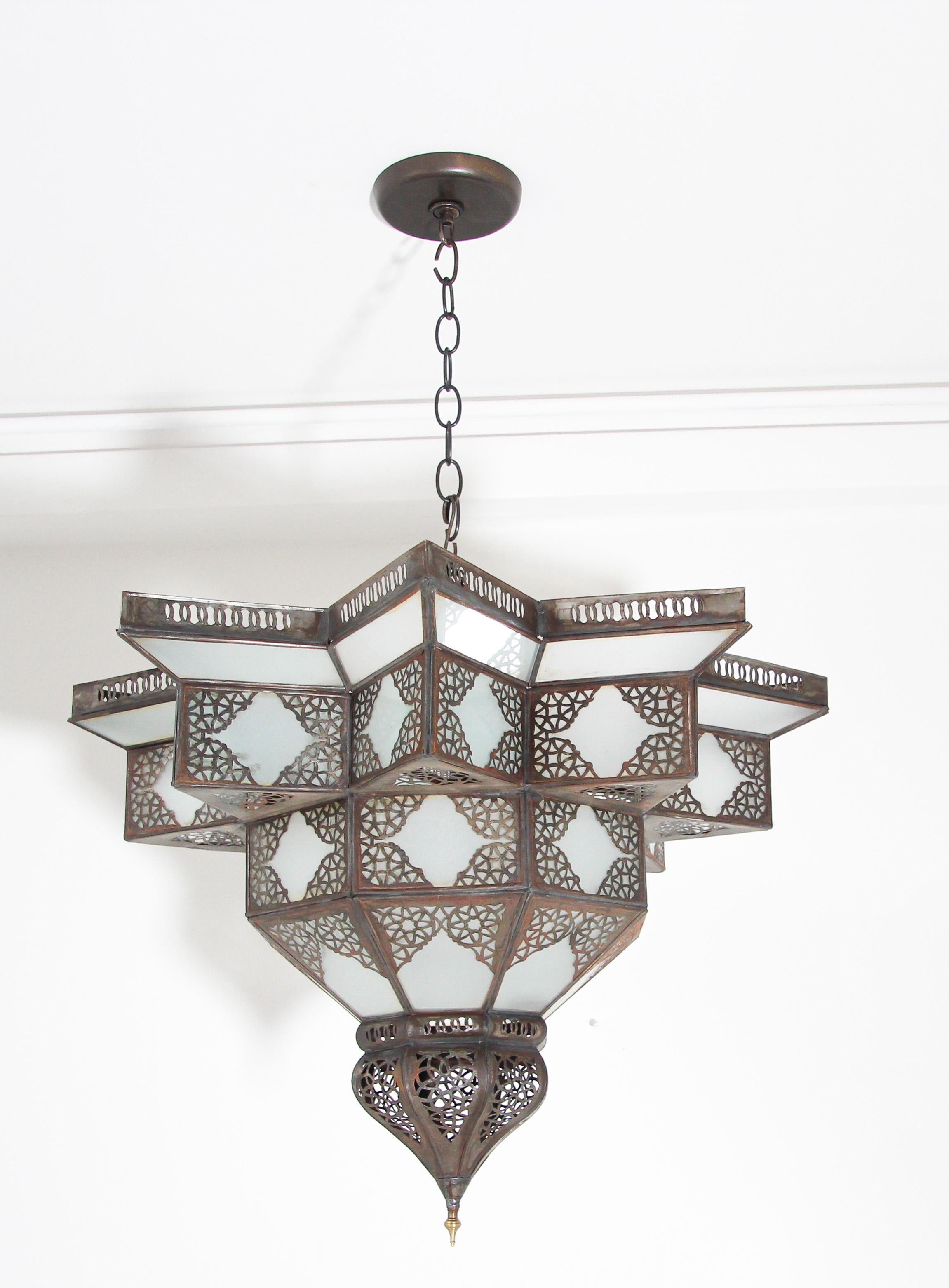 Large Moroccan hanging star pendant shade.
Large Moroccan frosted star shape glass chandelier shade
Handcrafted large Moorish Spanish style light fixture with a metal frame and frosted milky glass with delicate Islamic filigree metal work.
Shade