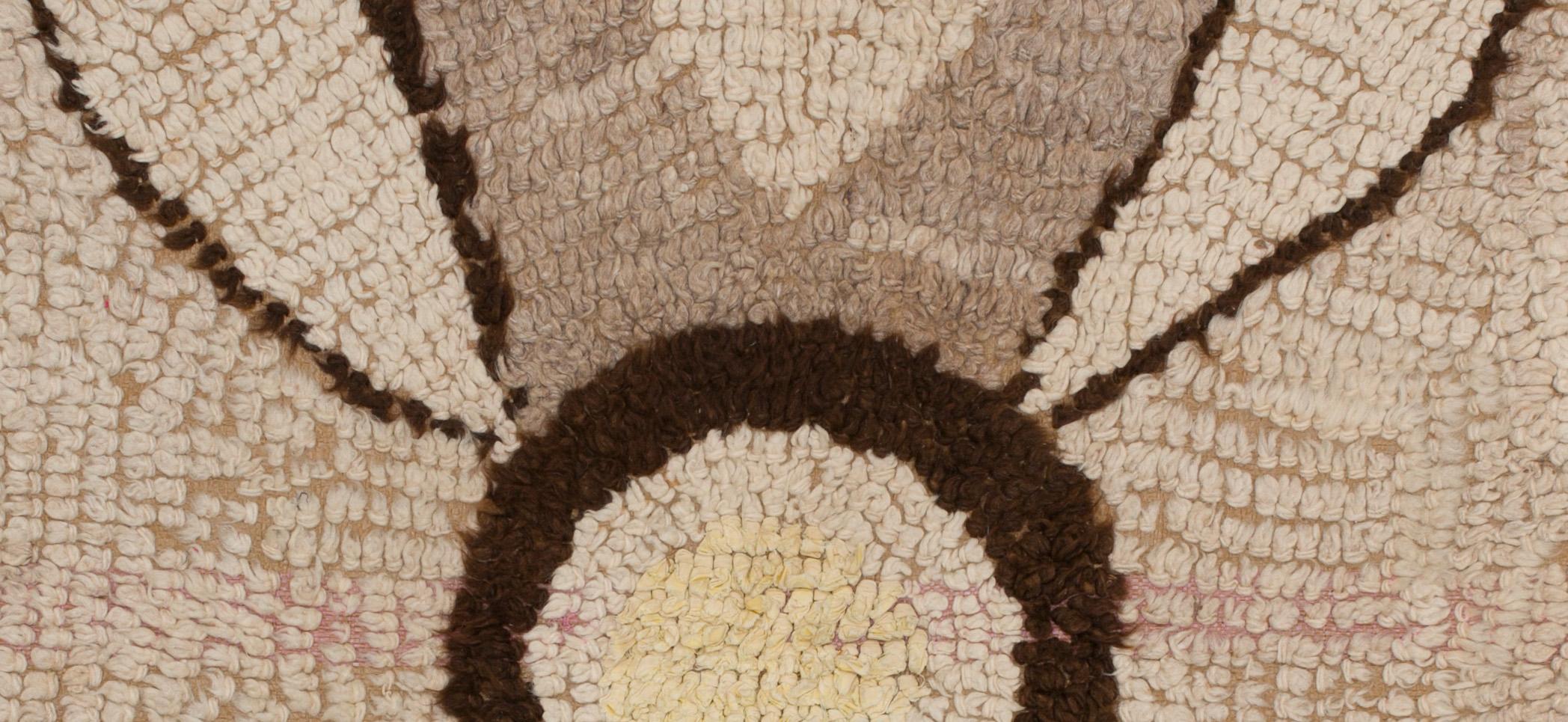 Amazing format for this tapestry made by Berber women from the Atlas Mountains.
Made from woolen ends and other threads, embroidered on wasted plastic bags of cereals, this unique and vintage work is the demonstration of the secret transmitted from