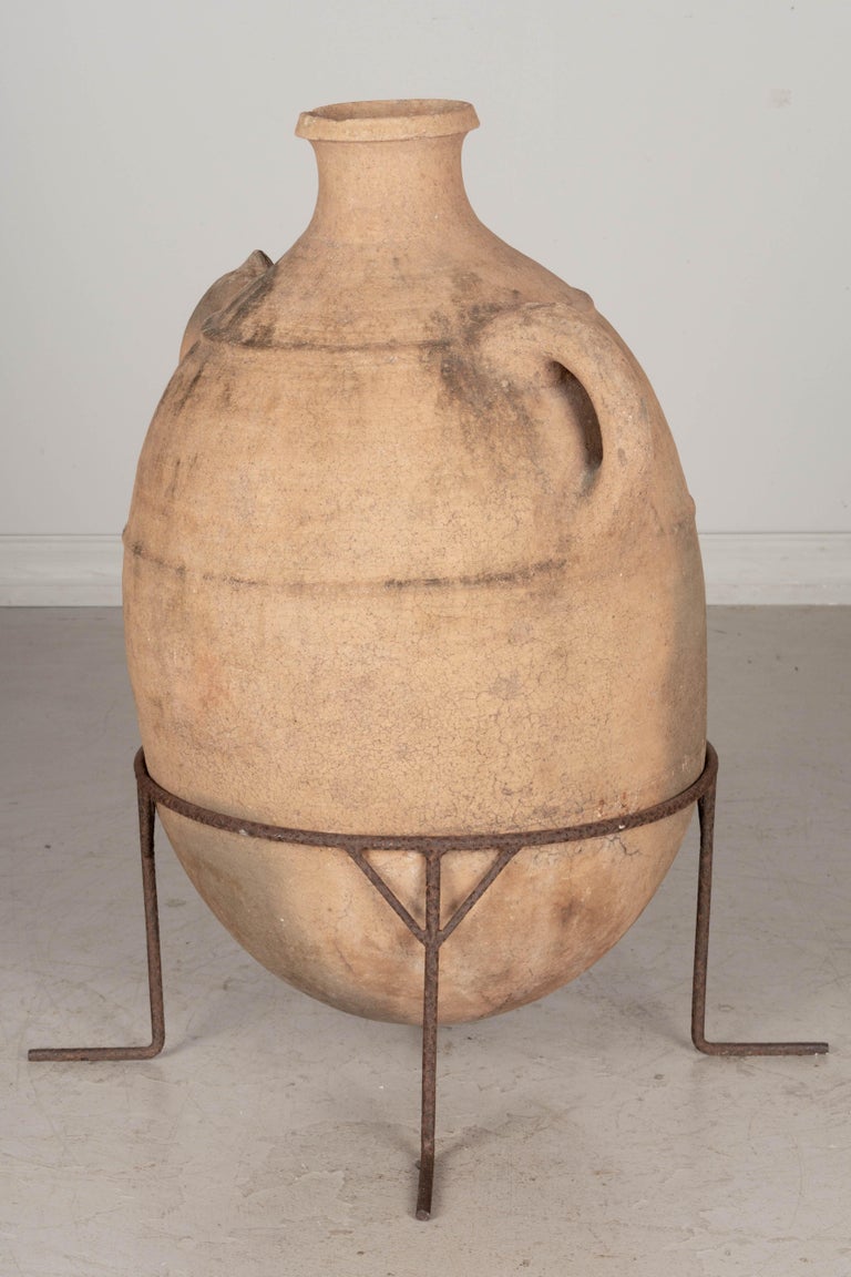 Large Moroccan Terracotta Pottery Water Jar in Iron Stand For Sale at