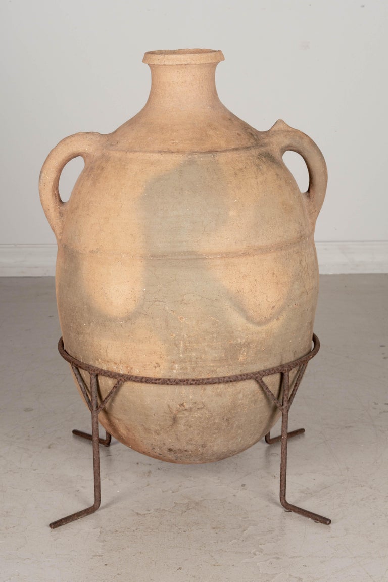 Large Moroccan Terracotta Pottery Water Jar in Iron Stand For Sale at