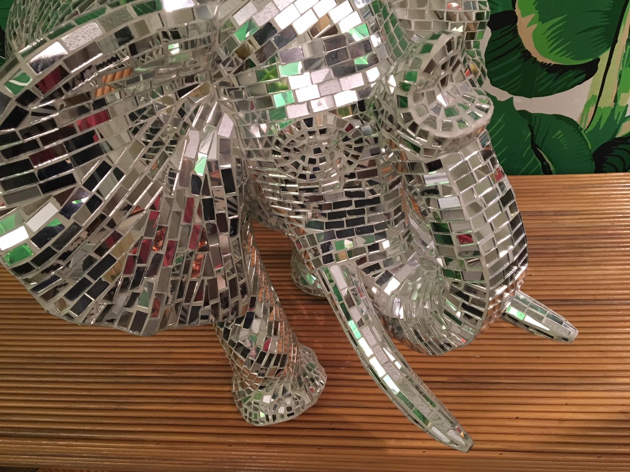 Large elephant sculpture covered in mirror tiles makes a statement in any decor. Stands 19