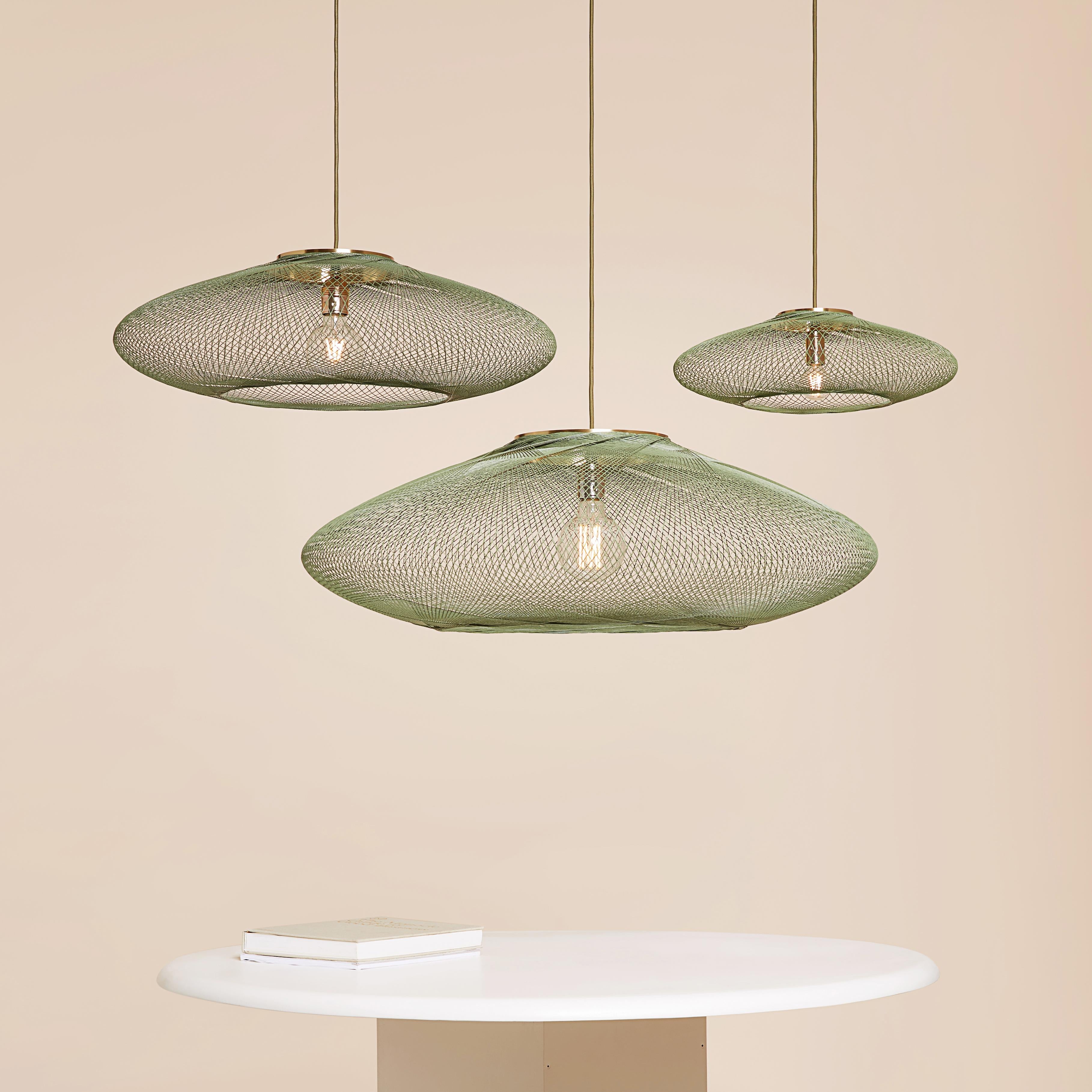 Large Moss Green UFO pendant lamp by Atelier Robotiq
Dimensions: D 80 x H 24 cm
Materials: Resin-impregnated industrial fiber, brass.
Available with holder in brass/ black coated stainless steel.
Available in different colors, 3 sizes, and in