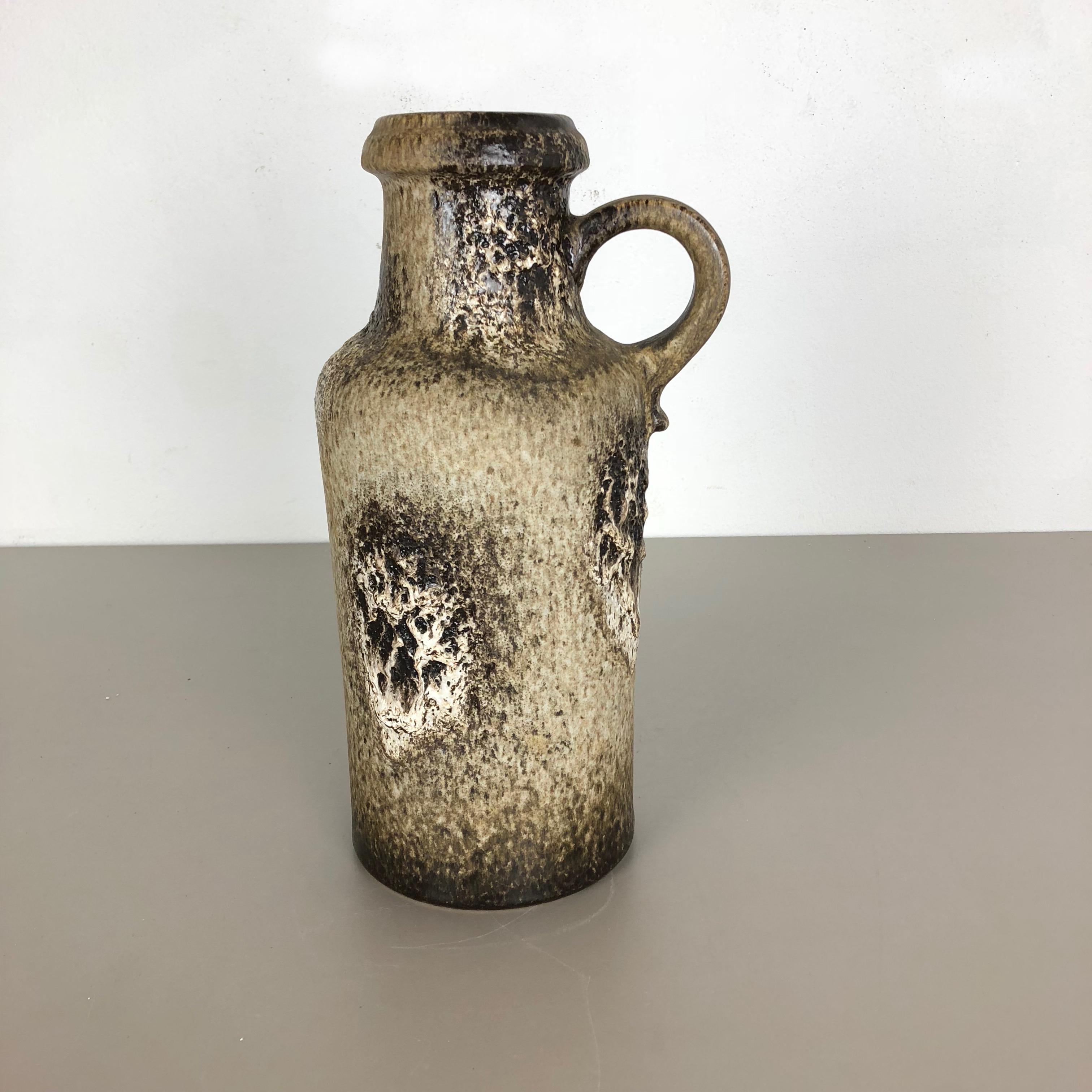 Article:

Fat lava art vase


Producer:

Scheurich, Germany


Design:

Nr. 407-35



Decade:

1970s.




This original vintage vase was produced in the 1970s in Germany. It is made of ceramic in fat lava optic. Super rare in