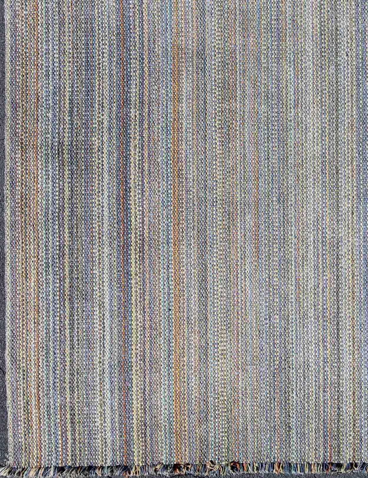 Measures: 8'5 x 11'2

This large American braided rug features a unique color palette coupled with a fine demonstration of American weaving. The tones of each stripe come together to produce a magnificent display of blended beauty.

Country of
