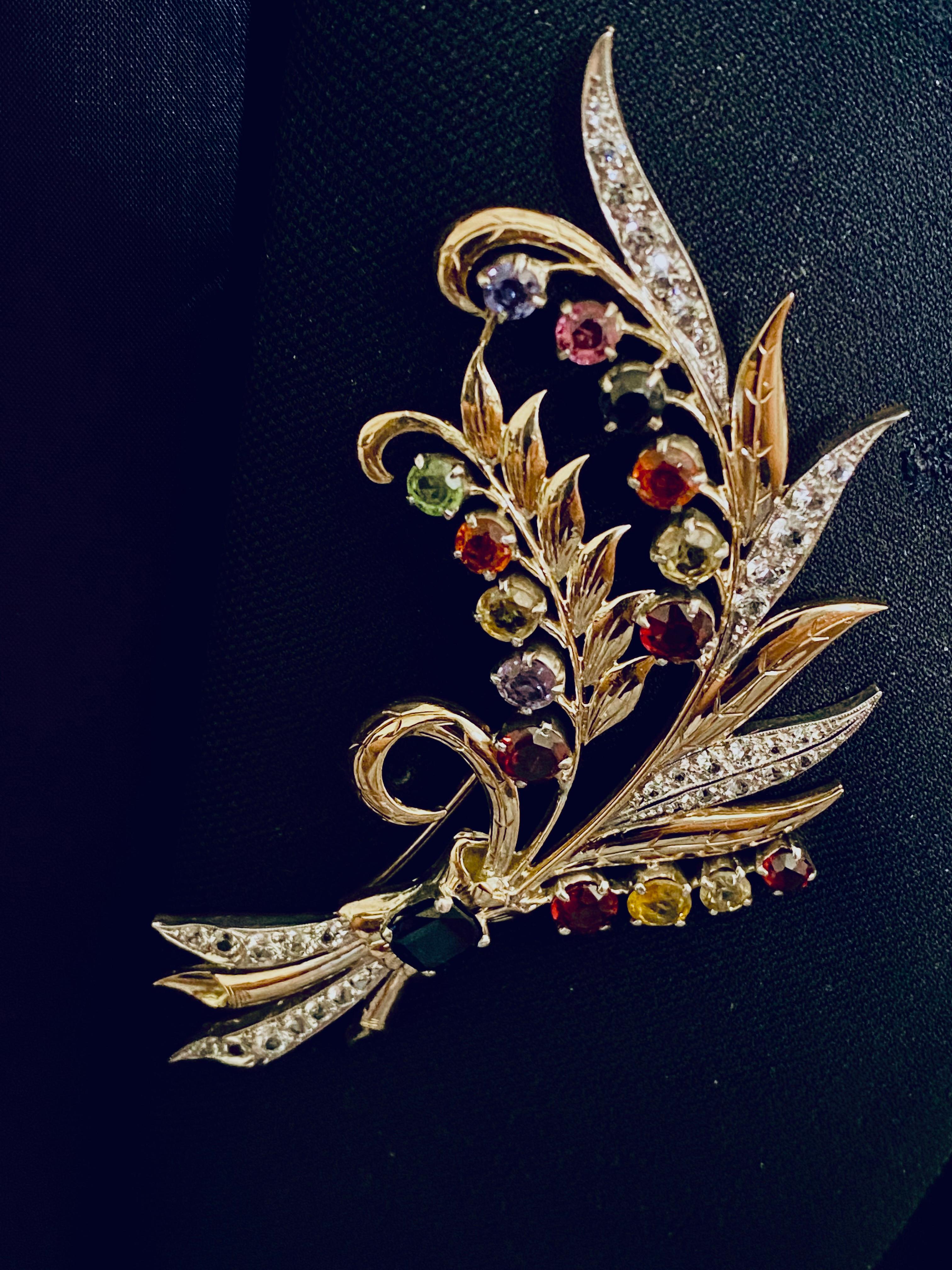 gemstone encrusted brooch