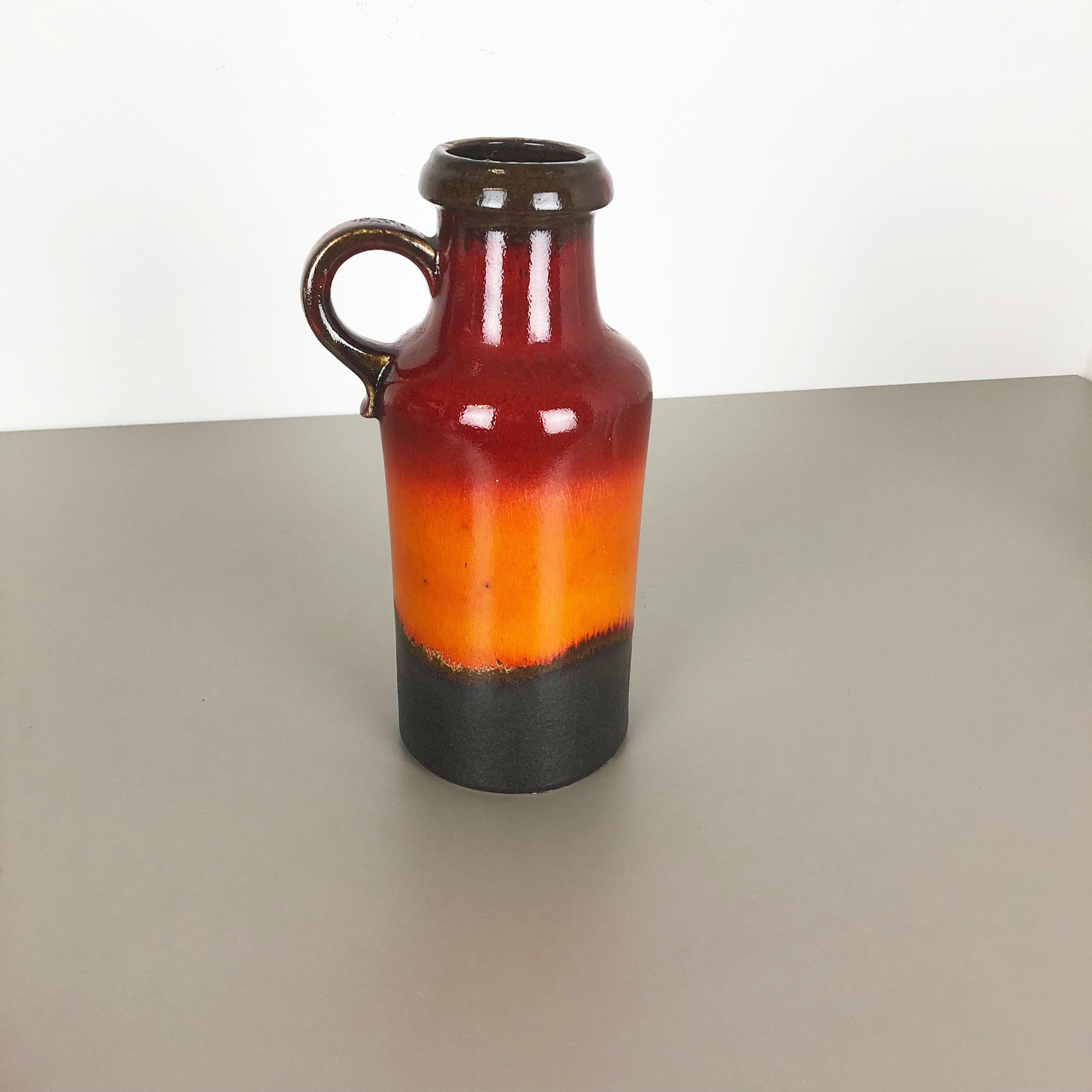 Article:

Fat lava art vase


Producer:

Scheurich, Germany


Design:

Nr. 407-35



Decade:

1970s.




This original vintage vase was produced in the 1970s in Germany. It is made of ceramic in fat lava optic. Super rare in