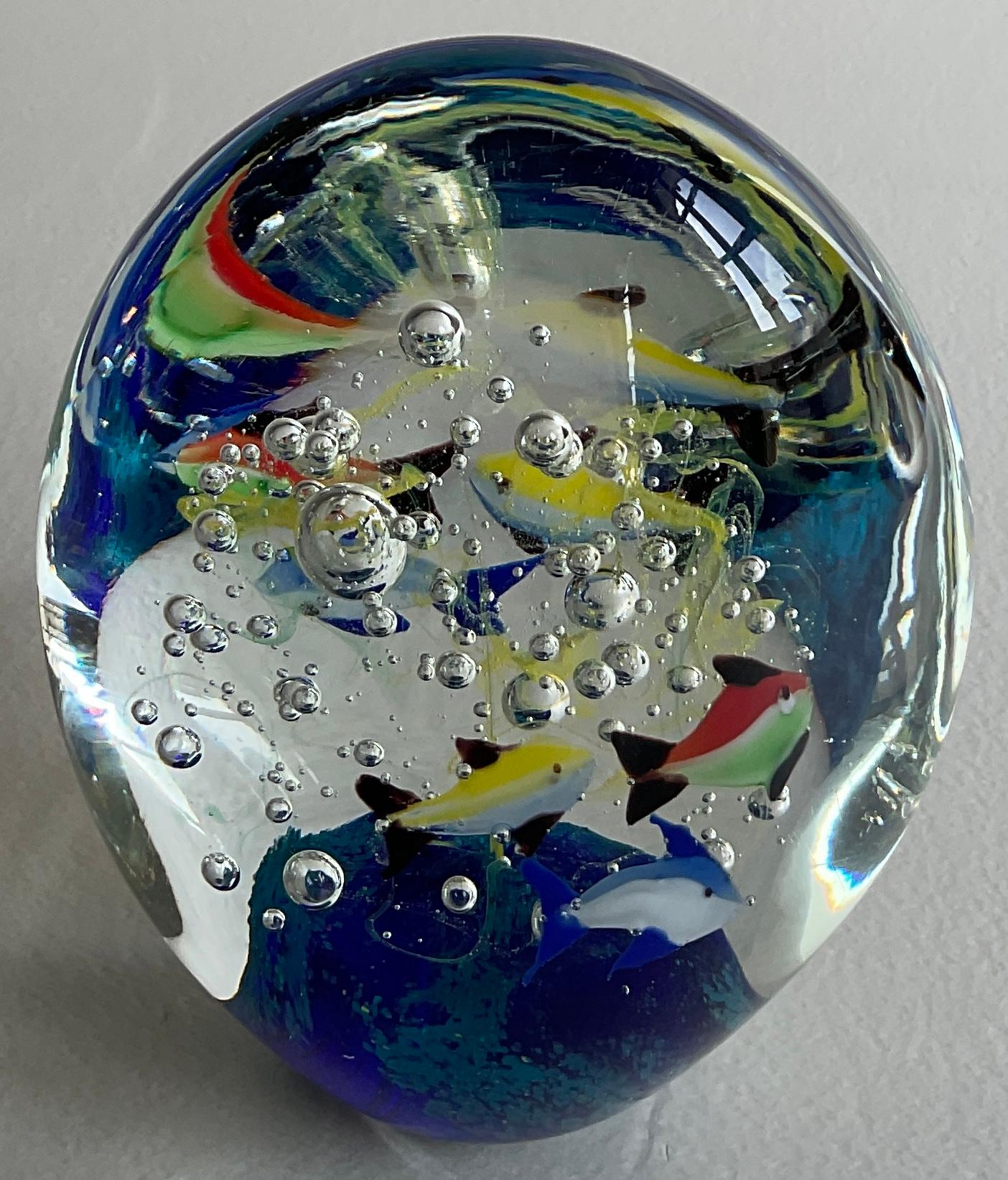 Very unique and rare shaped Murano paperweight depicting an ocean scene or an aquarium with fish, ocean plants and bubbles. 

This is a wonderfully animated and decorative piece. Perfect for any desk, table or shelf. 

Perfect vintage condition.