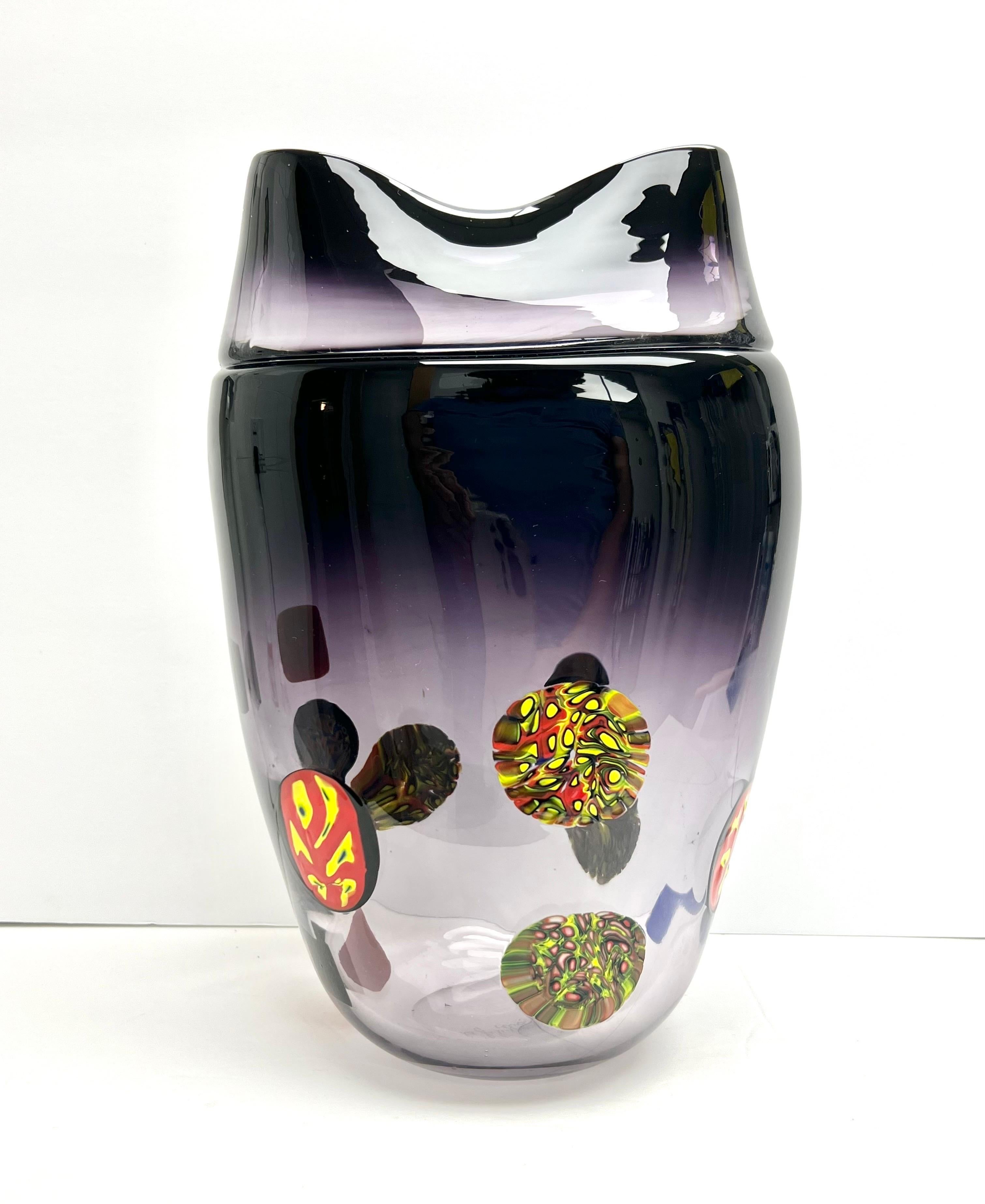 Great looking art glass vase. Incalmo with large modern murine inclusions.