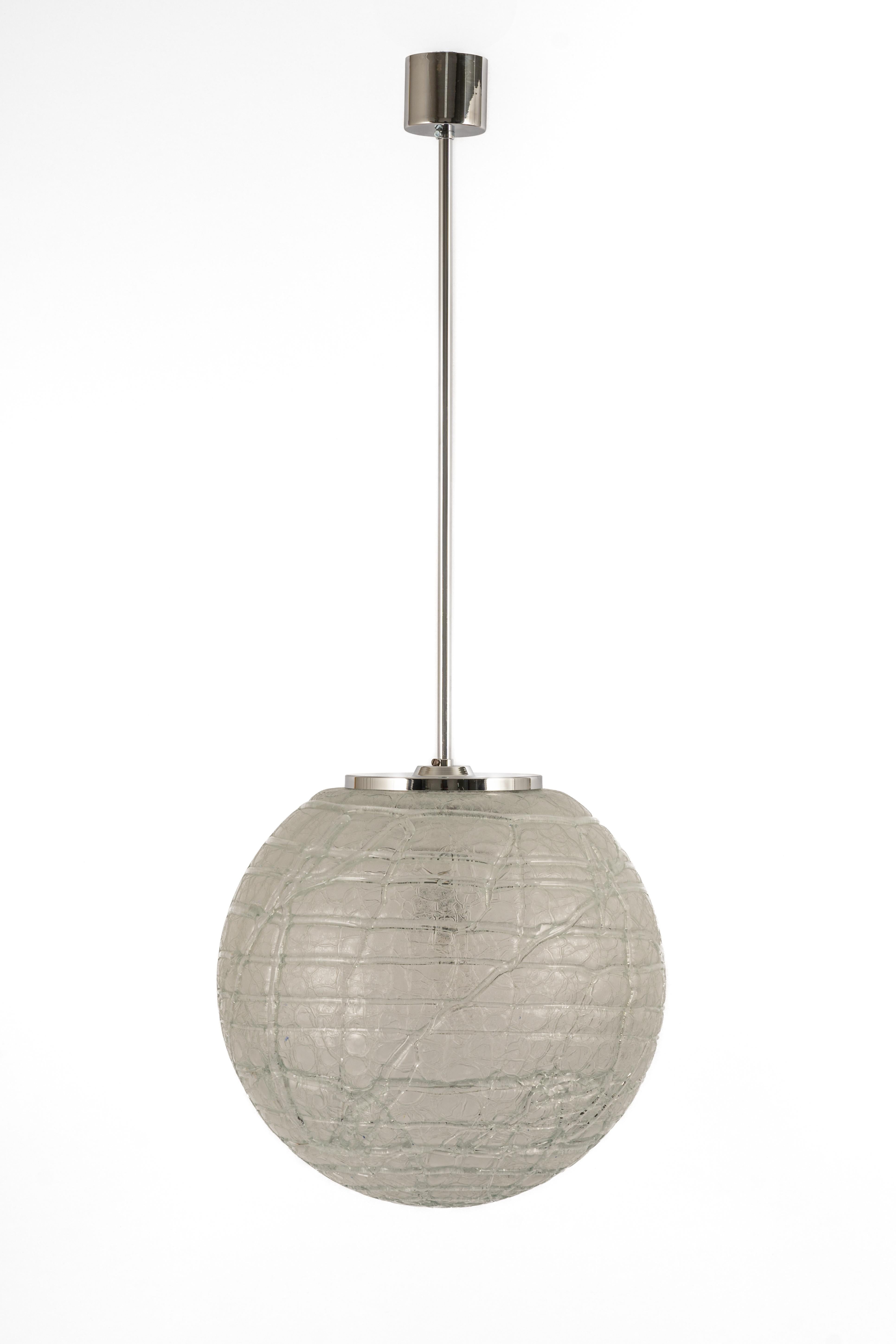 Doria Pendant light with large volcanic Murano glass ball.
High-quality materials, give a wonderful light effect when it is on.

Sockets: One E27 standard bulb. Max 100 Watts.
Light bulbs are not included. It is possible to install this fixture