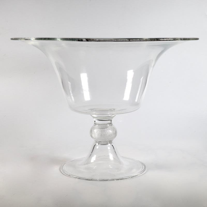 Stunning in its simplicity this large Murano baluster shaped centrepiece of clear hand blown crystal with a wonderful gold and silver flecked rim and stem. Signed Seguso Vetri d'Arte to base, circa 1980.