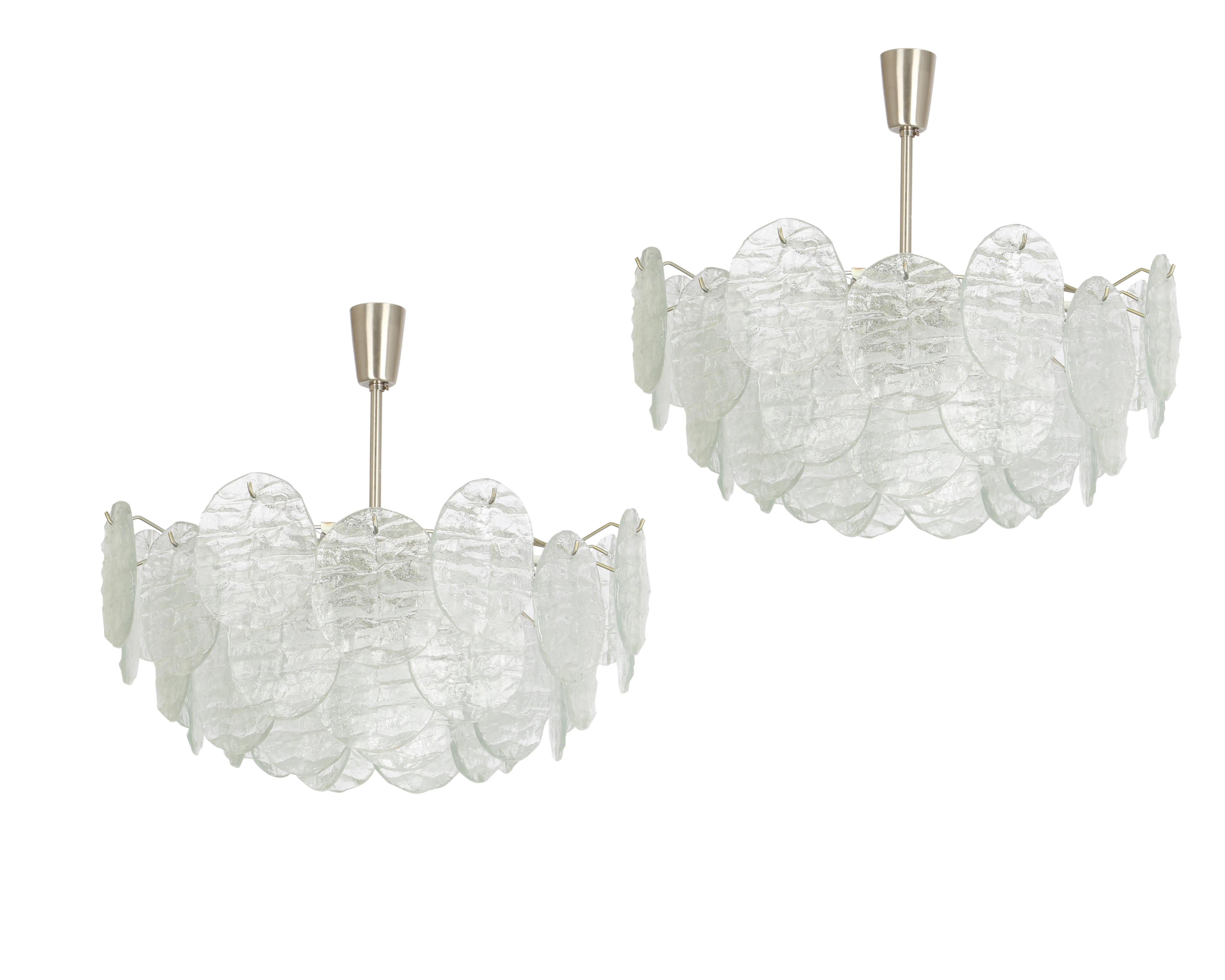 Stunning Murano glass chandelier by Kalmar, 1960s
Five tiers structure gathering 44 disc-shaped glasses in the form of leaves hang on a nickel-plated wireframe, beautifully refracting the light.

High quality and in very good condition with minor