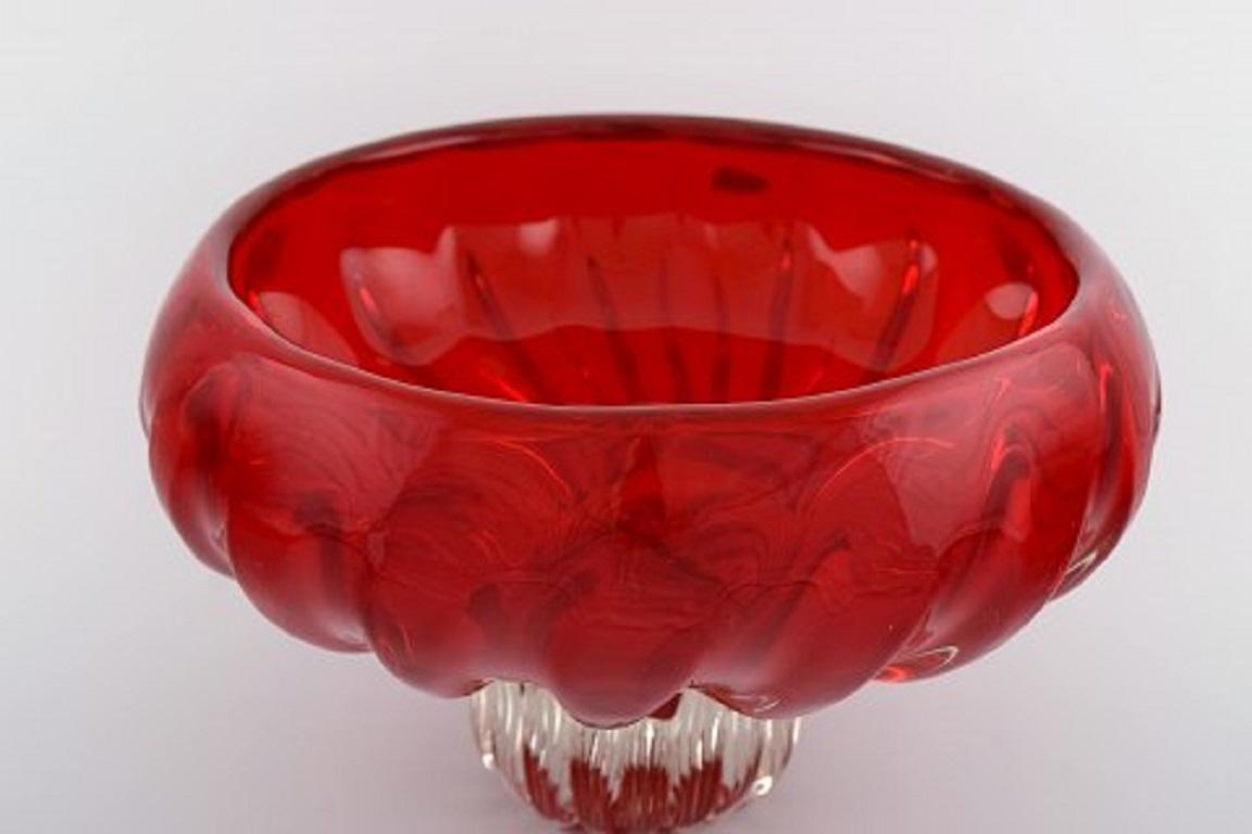 Large Murano bowl on foot in red and clear mouth blown art glass. Italian design, 1960s.
Measures: 25 x 15 cm.
In perfect condition.