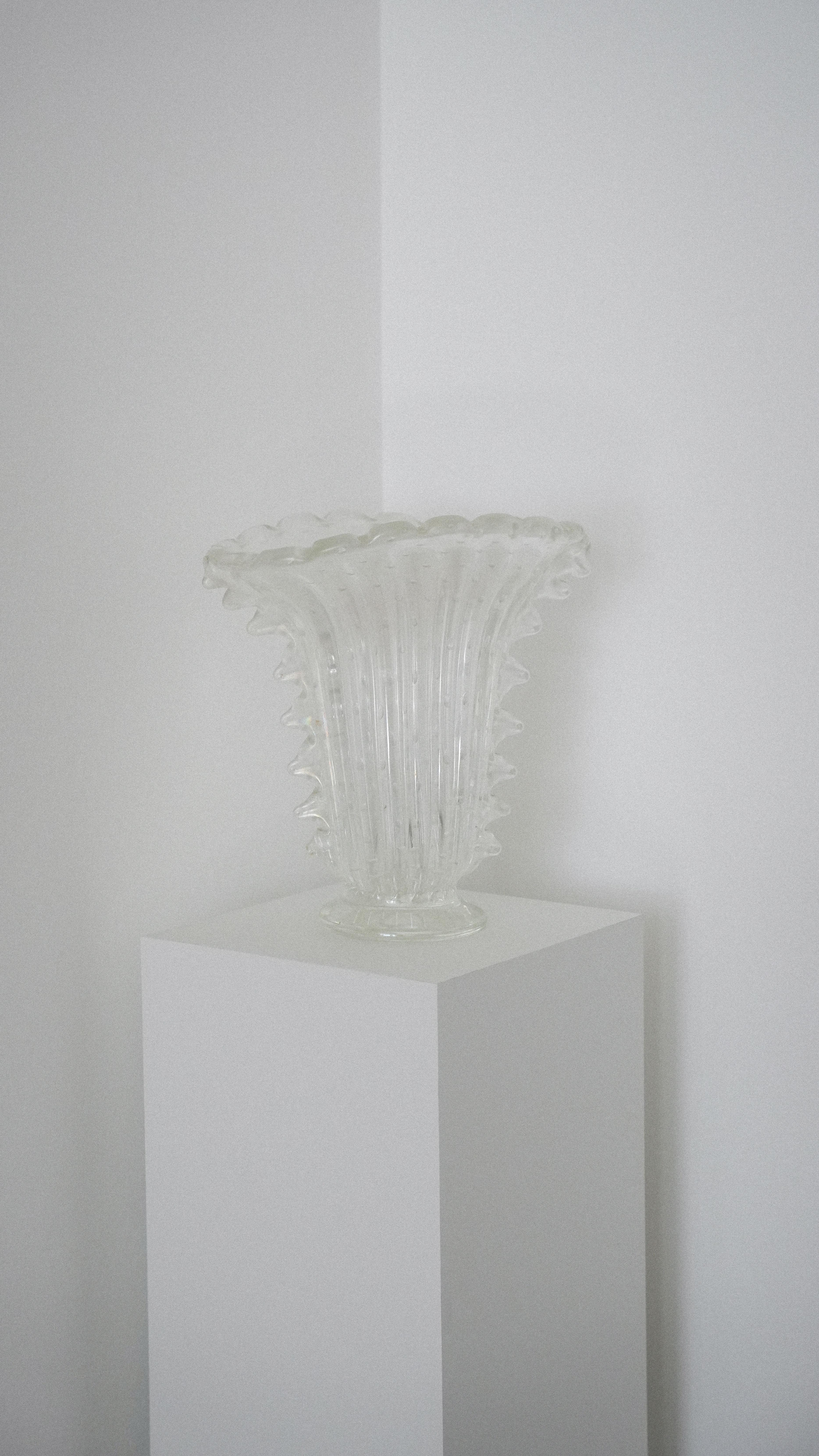 Large Murano glass bullicante vase with lateral “morise” decoration by Ercole Barovier for Barovier & Toso, c. 1940s. 

Hand made in Murano, Italy in the early to mid-20th century, the bullicante technique results in bubbles visible in the glass.