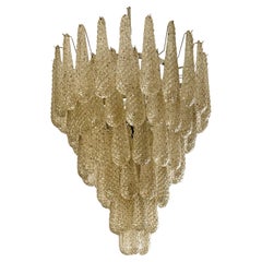 Large Murano Chandelier in the of style of Venini in amber tone.