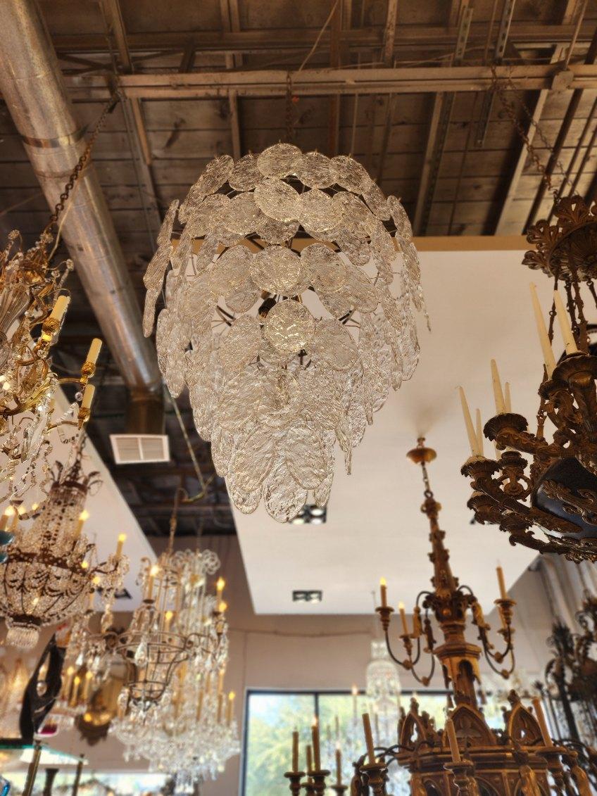 Large Murano chandelier Multi-Tiered with hammered texture glass with 10 lights and 146 glass pieces.


