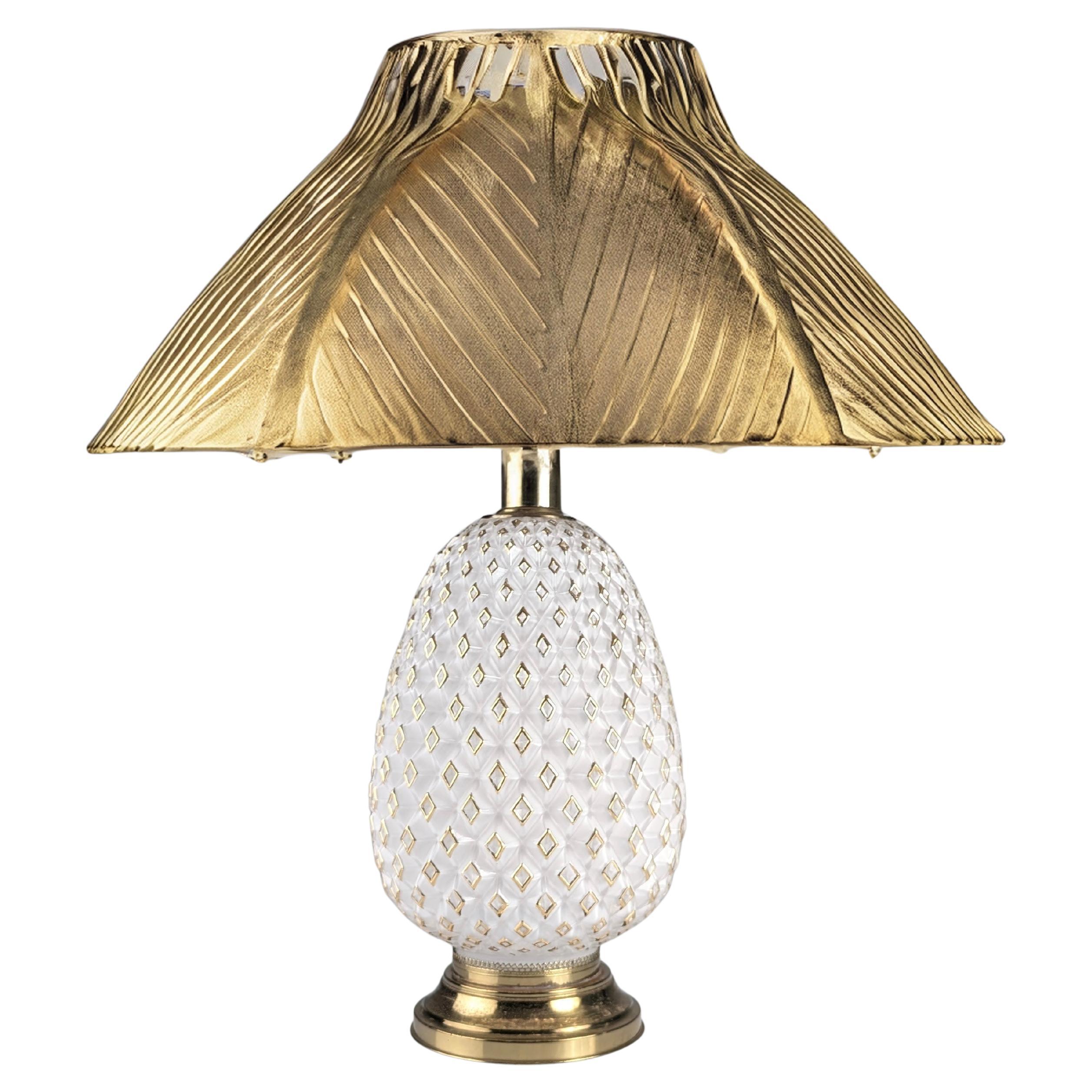 Beautiful large-sized table lamp in the shape of a pineapple. An impressive piece of Mid-Century Modern style, made in Italy during the 1970s. The body is crafted from white Murano glass with a geometric relief pattern that enhances its