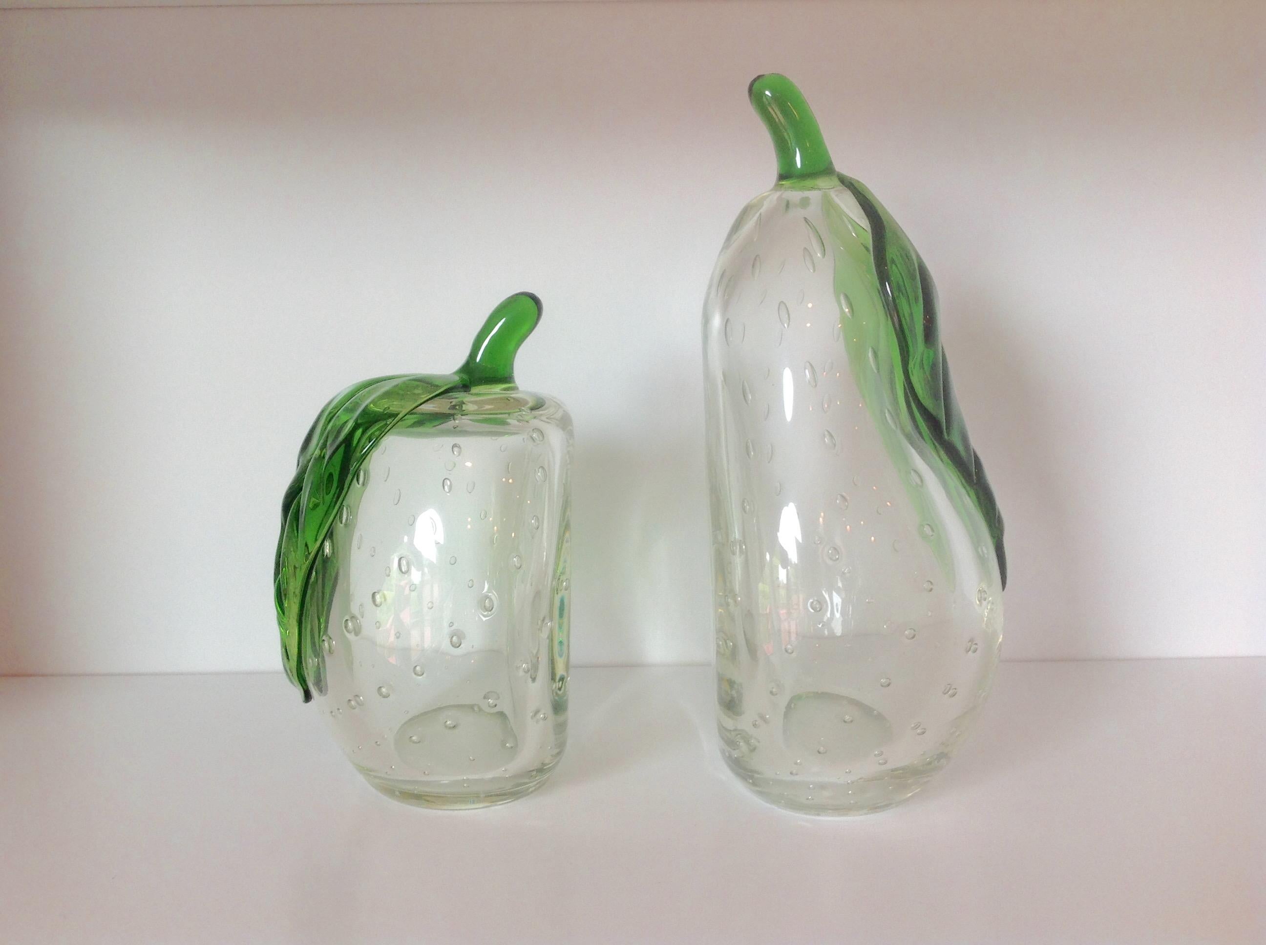 Large apple and pear bookends in Murano glass. Pear is 10 inches tall, by 4 inches deep by 5.5 inches wide. Apple is 7 inches tall, by 4 inches deep, by 5.25 inches wide.