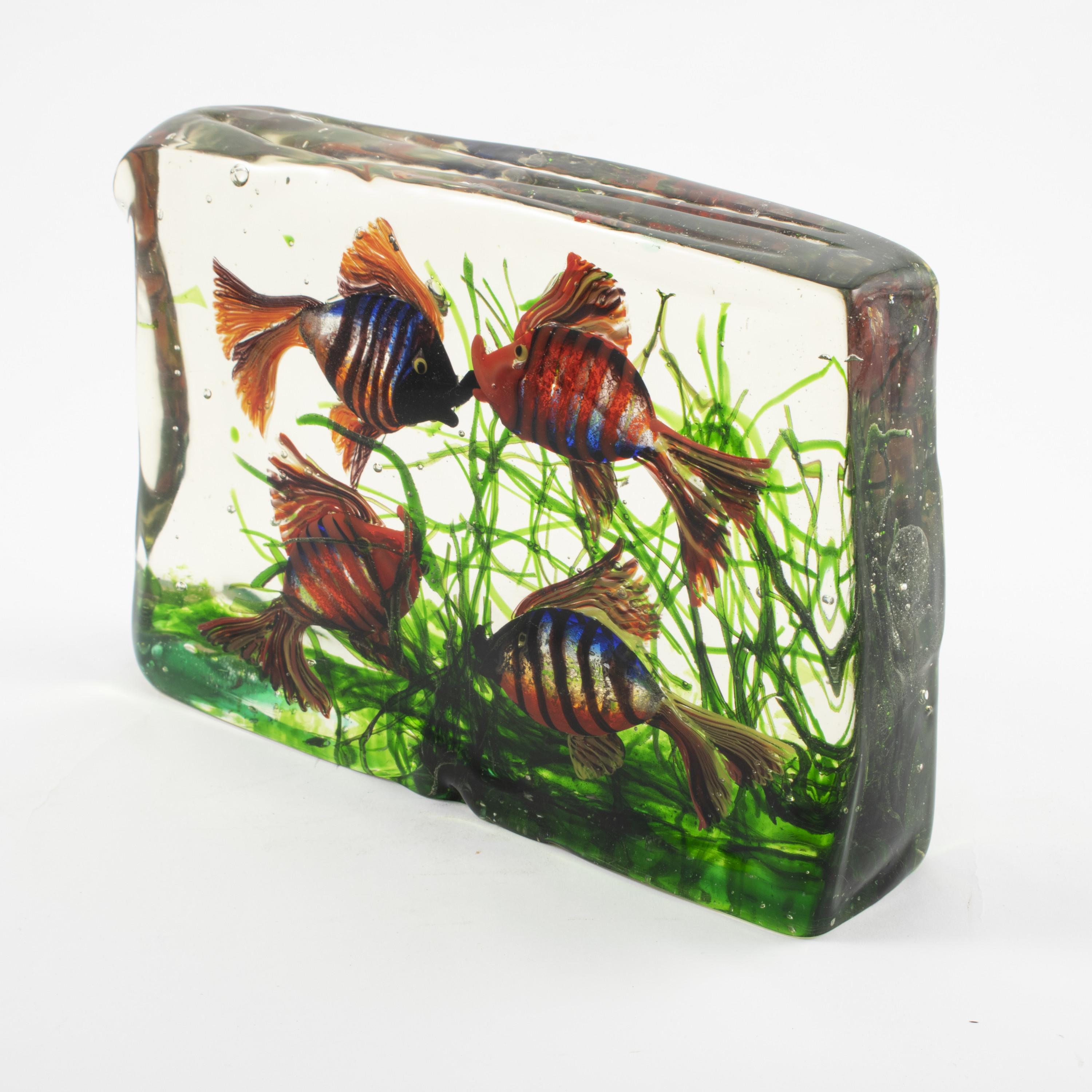 Murano hand blown Italian art glass aquarium paperweight / sculpture.
Three dimensional water scene with polychrome fish and sea grasses.
By Archimede Seguso (1909-1999), from his own glass workshop. Italy, Venice 1950's.
 