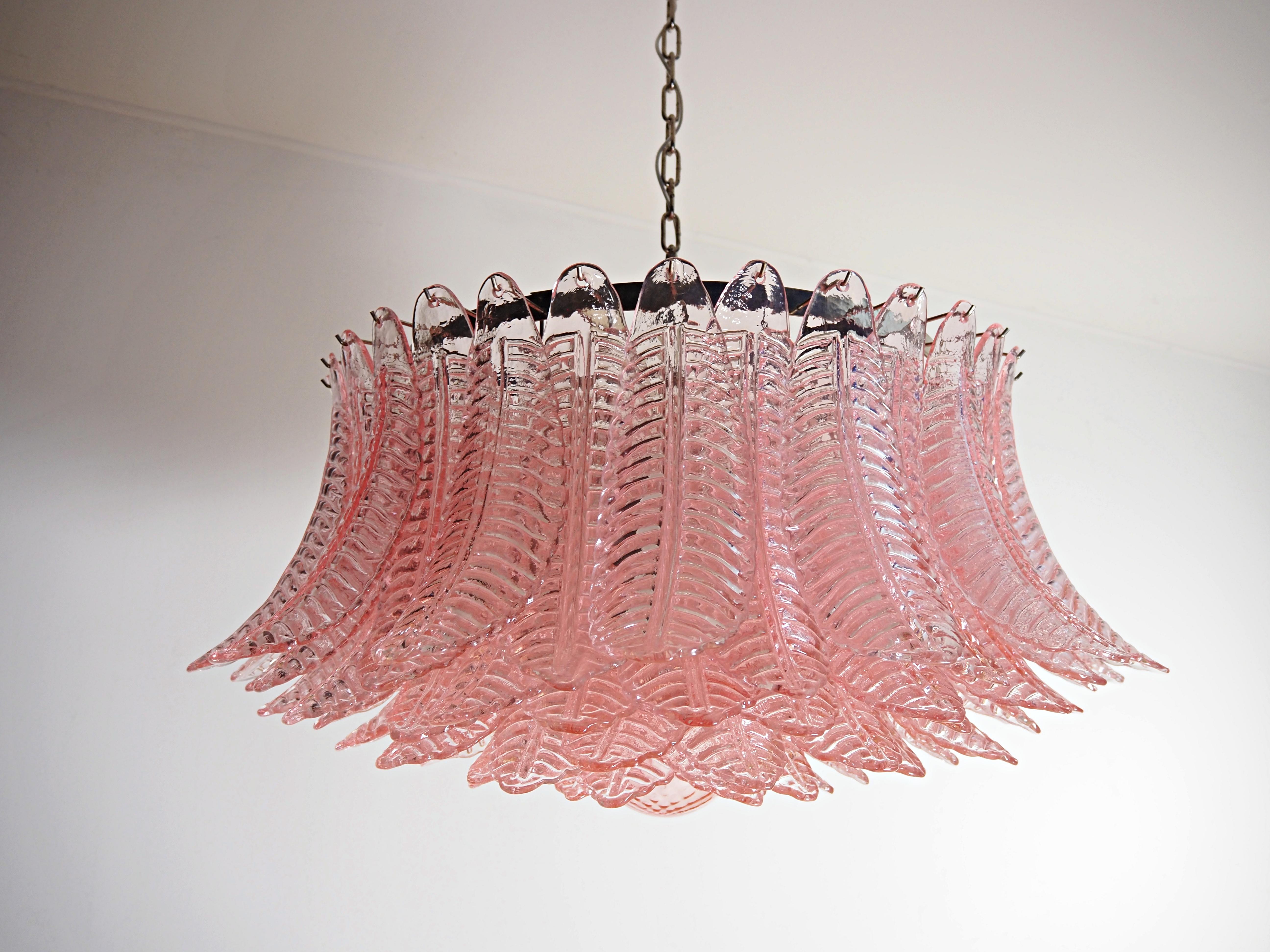 Italian vintage chandelier in Murano glass and nickel plated metal structure. The polished nickel armor supports 100 large pink glass leaves ferns plus a glass sphere used as a pink finish. Can be used as a chandelier with chain, or as a ceiling