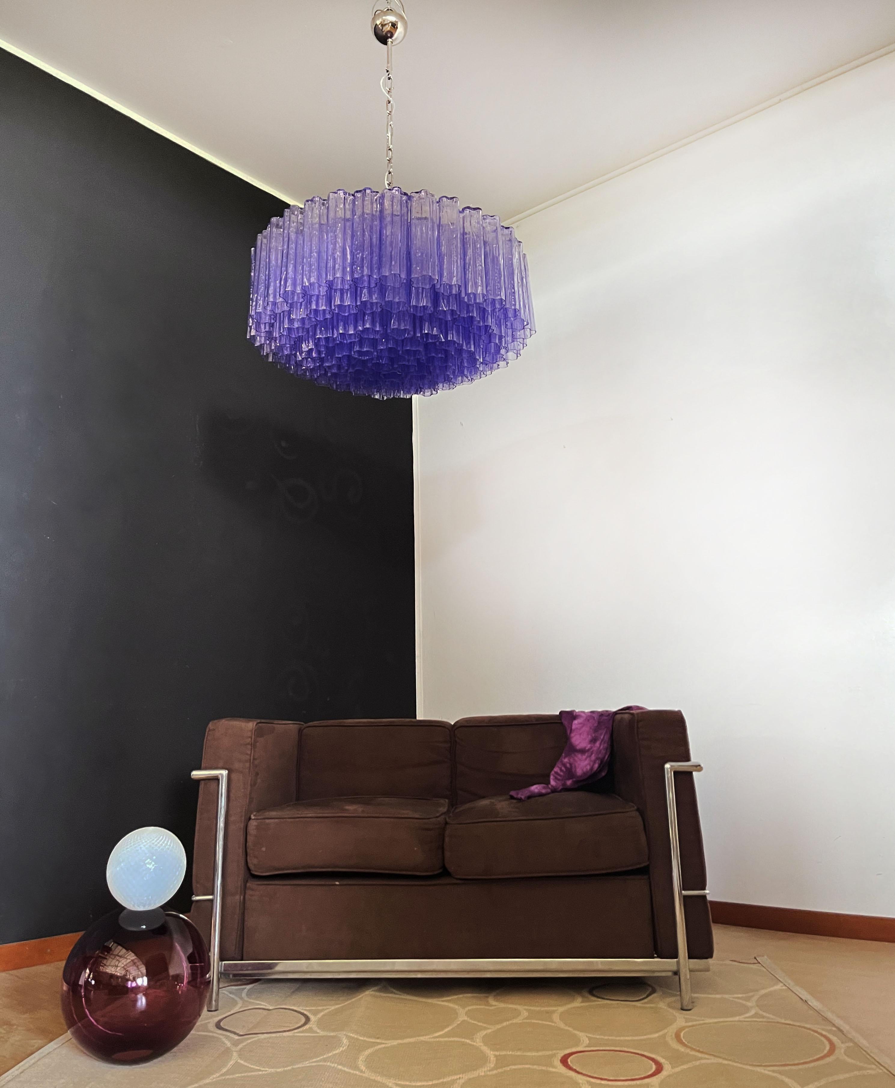 Italian vintage chandelier in Murano glass and nickel plated metal structure. The armor polished nickel supports 101 large amethyst glass tubes in a star shape. Can be used as a chandelier with chain, or as a ceiling light, the structure will be