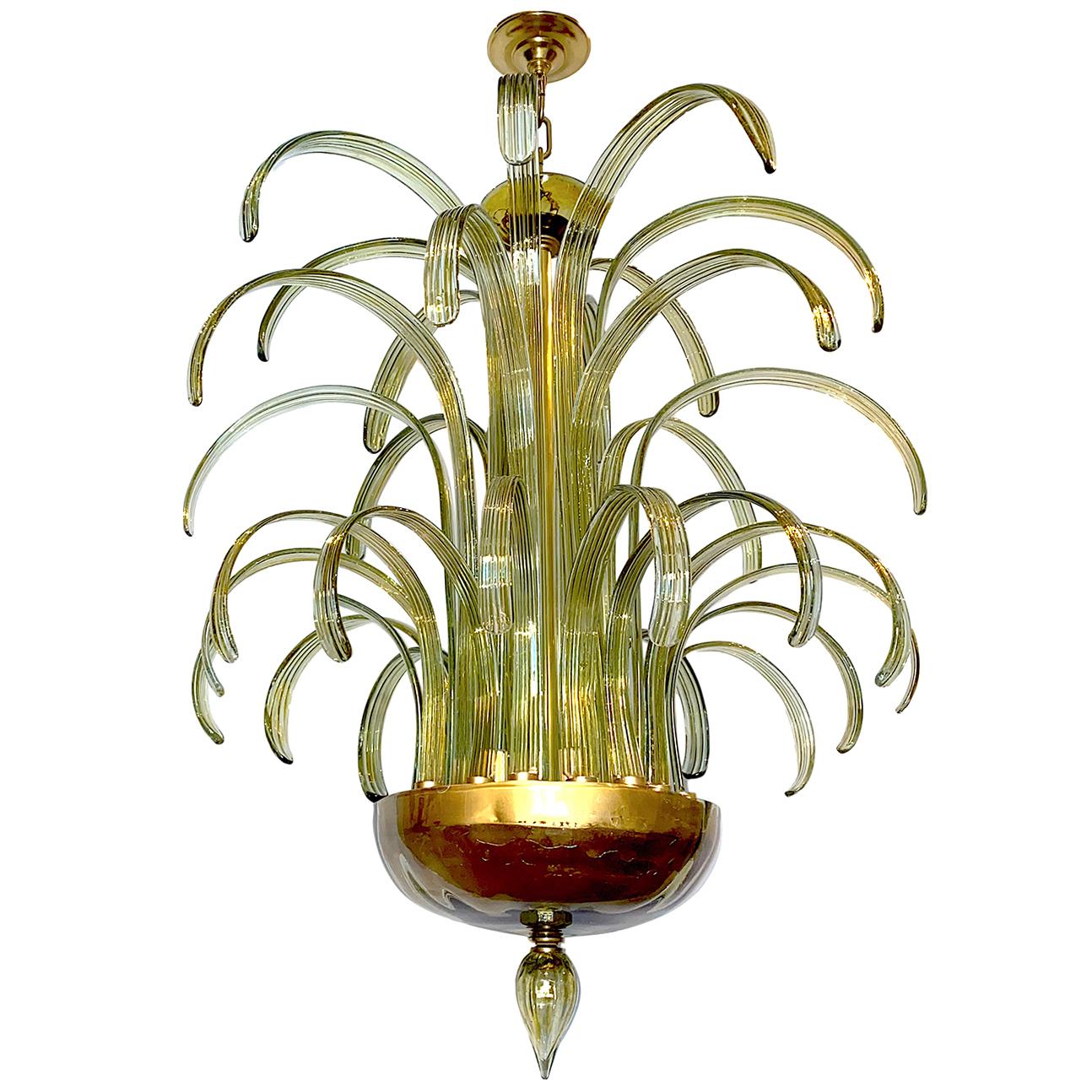 A large Italian blown glass eight-light chandelier with long pale green blown glass fronds, bowl and finial.

Measurements:
Drop (adjustable): 50