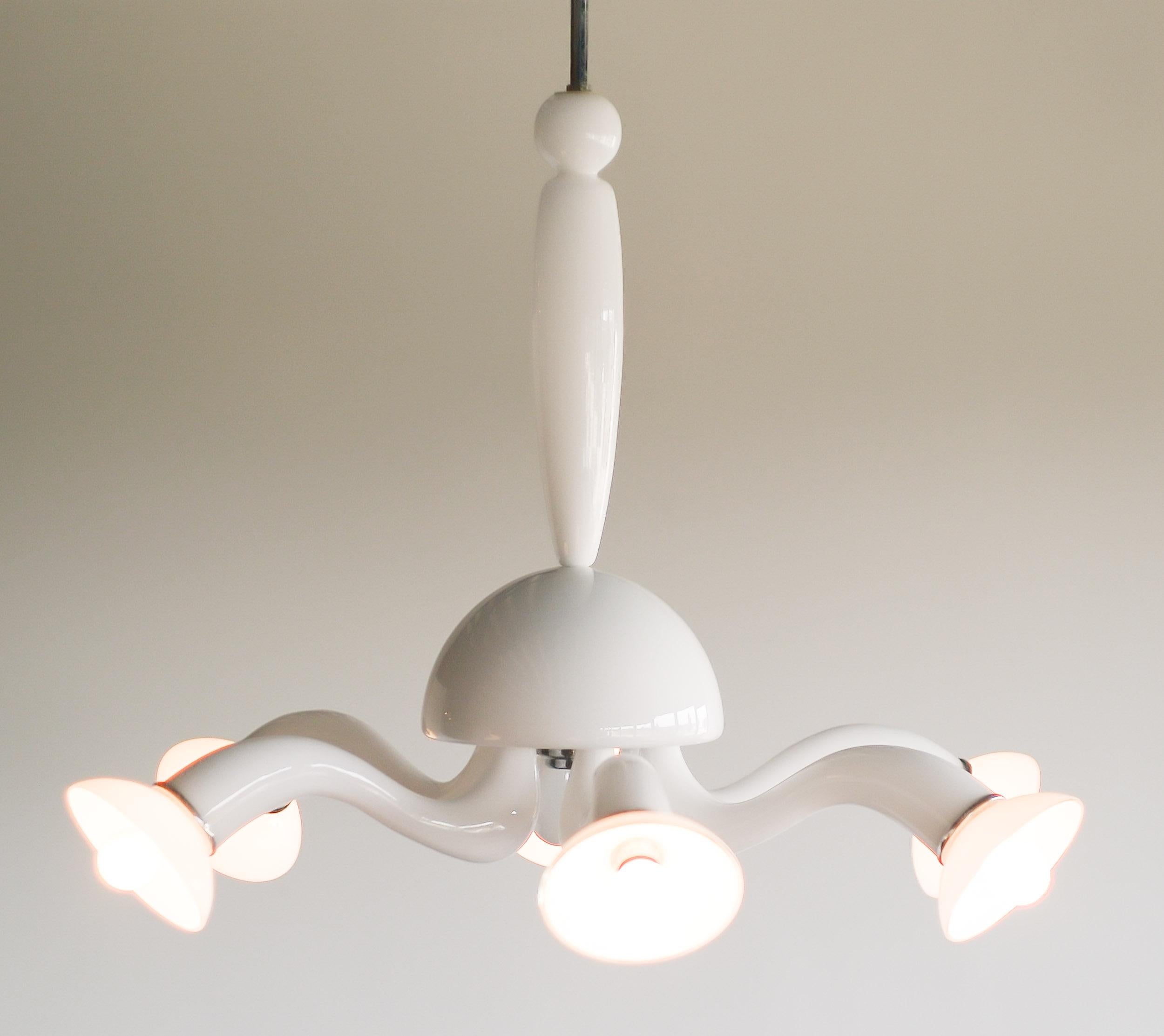 Delicate white Murano glass chandelier with chrome hardware.