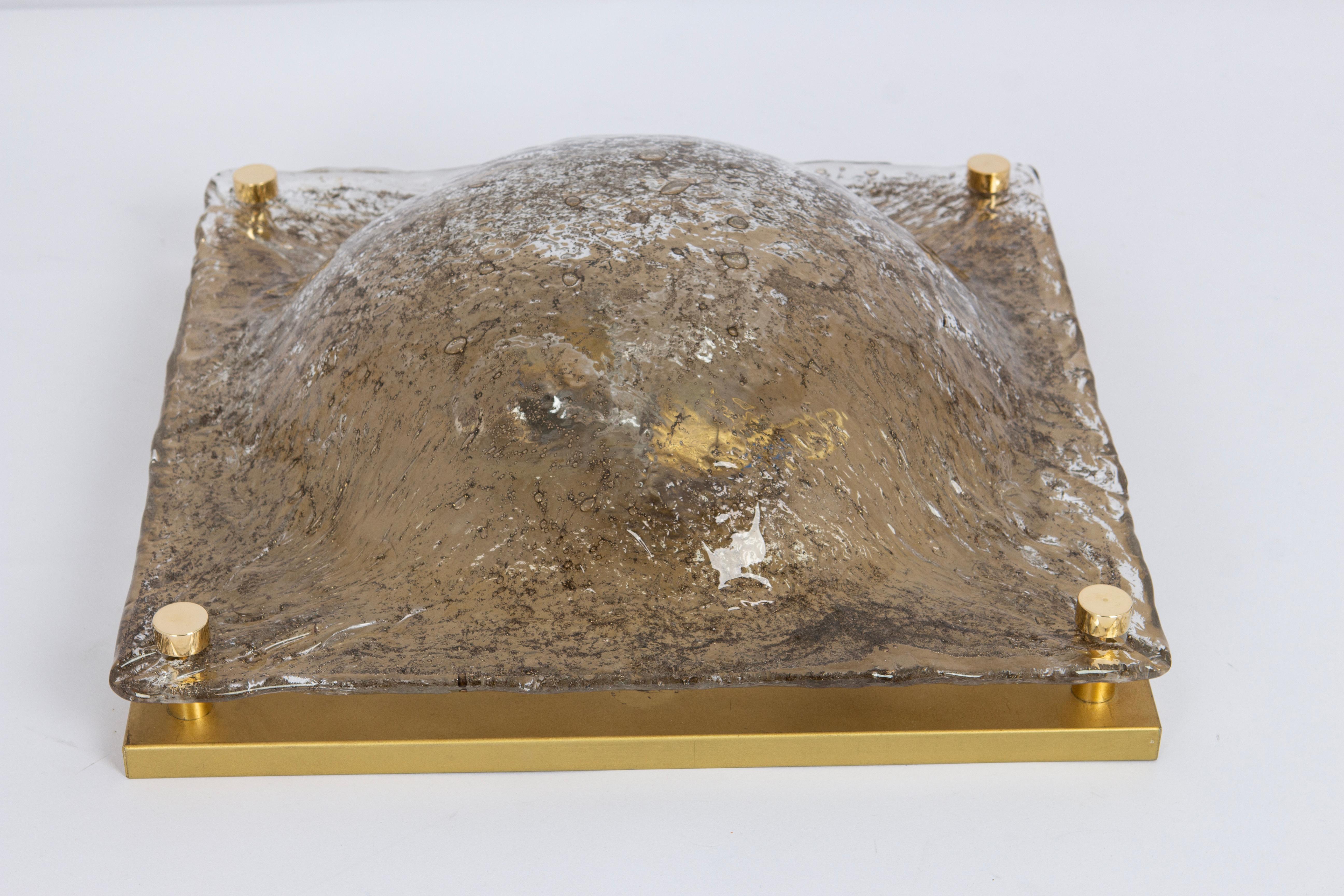 A wonderful Murano glass flush mount by kaiser, Germany, 1970s.
Thick textured Glass fixtured on a metal base.

High quality and in very good condition. Cleaned, well-wired, and ready to use. 

The fixture requires 2 x E27 standard bulbs with 60W