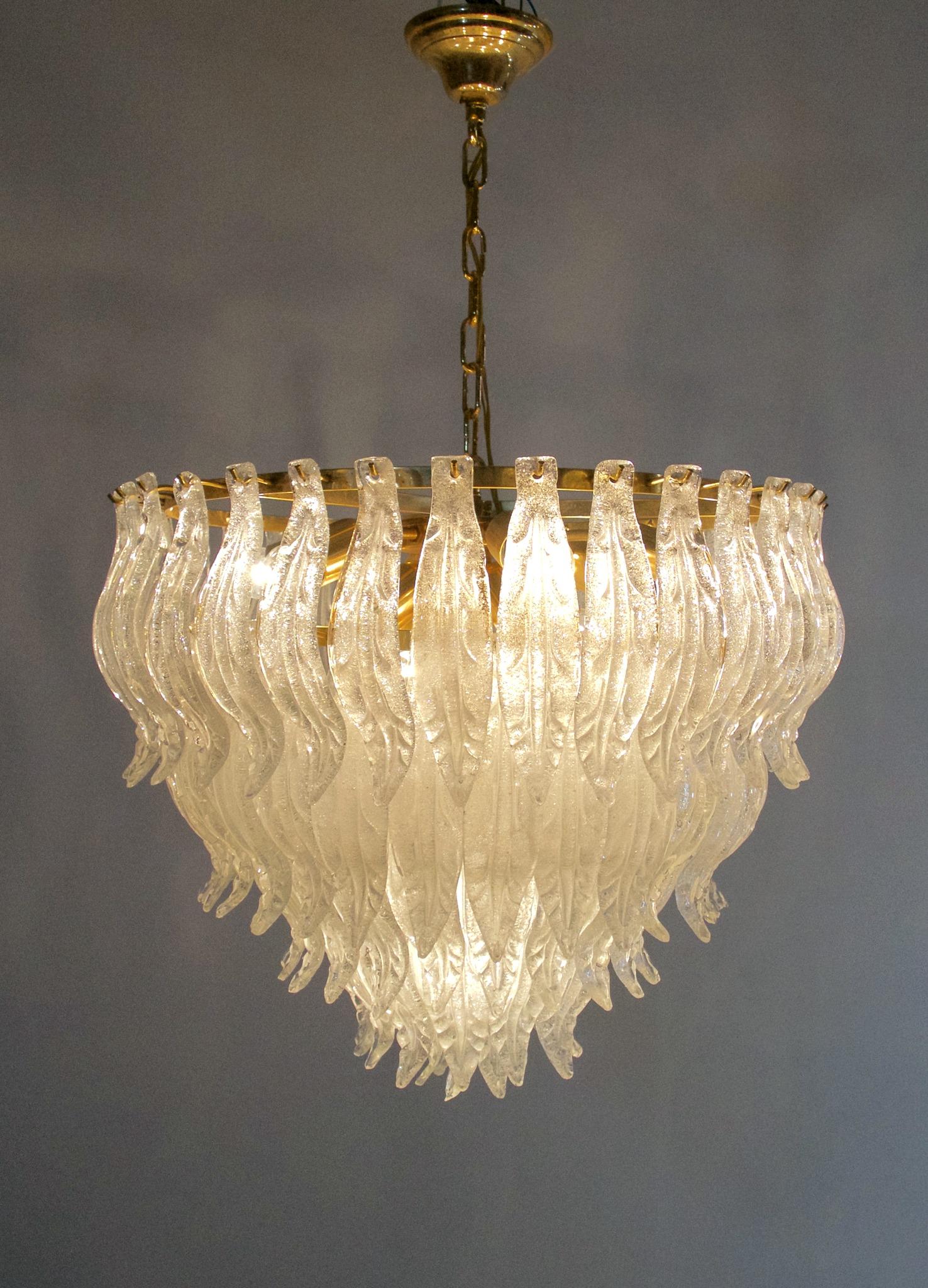 Magnificent large Murano Italian glass leaf chandelier with clear/frosted hand blown glass leaves suspended on a gold frame. Wiring works for the US as well as Europe and uses 11(eleven) E14 bulbs. There are 101 glass leaves that really sparkle when