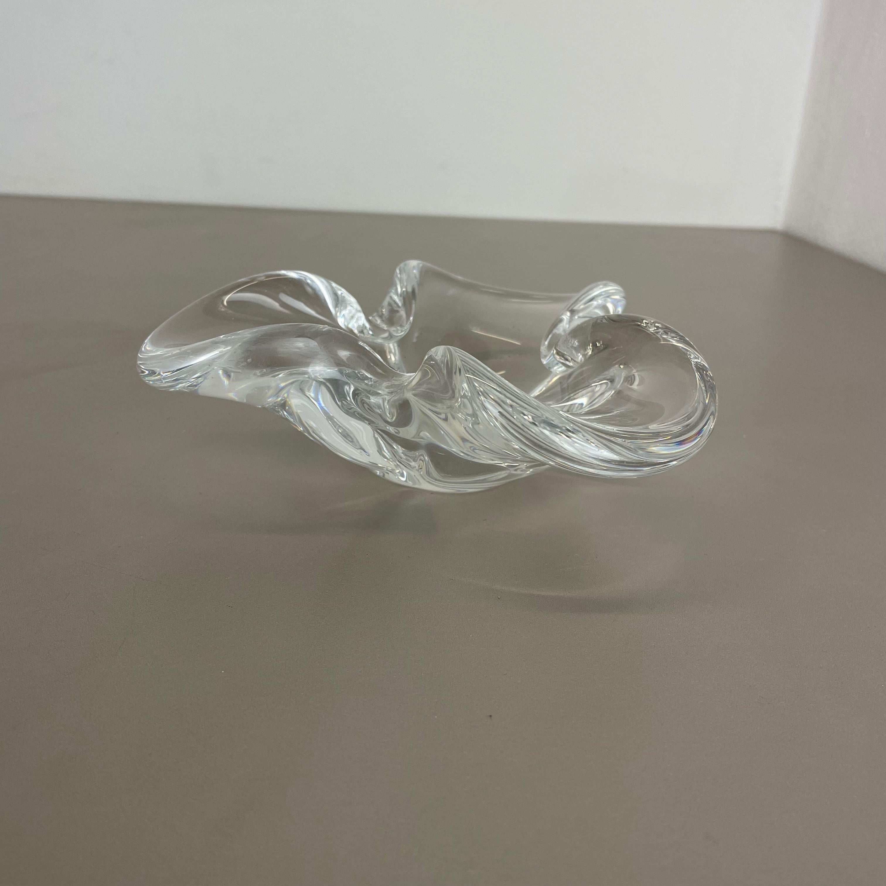 Article:

Murano glass bowl, ashtray element


Origin:

Murano, Italy


Decade:

1970s



This original vintage glass bowl element, ash tray was produced in the 1970s in Murano, Italy. It is made in clear glasstechnique and has a