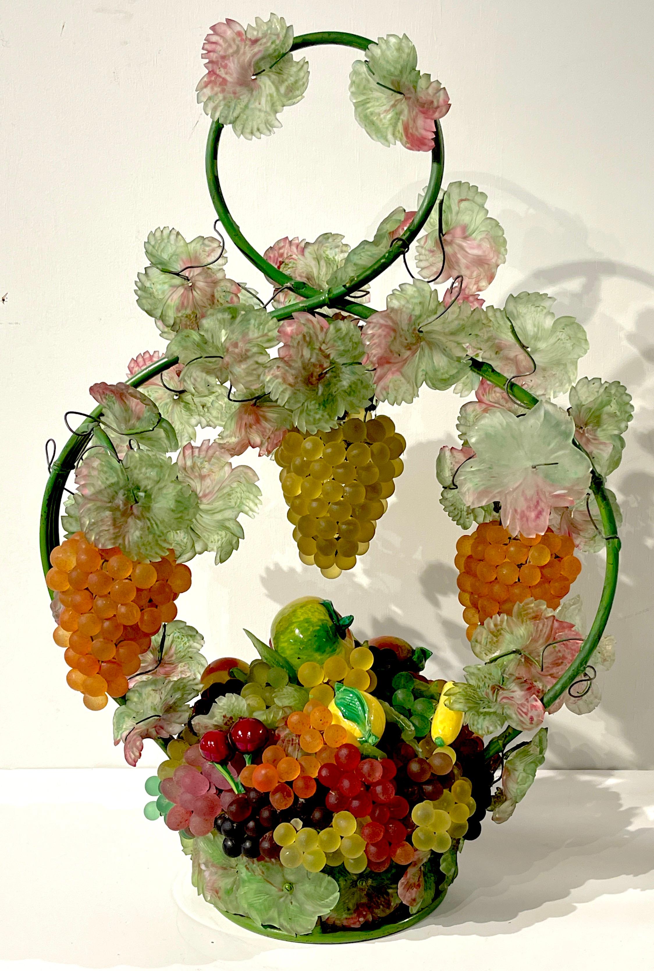 Large Murano Glass Multi-Colored Basket of Fruit Table Lamp
Italy, Circa 1950s
A large example of the imaginative Murano glass works, with three hanging clusters of grapes from the handle of the basket, below is an abundance of Murano glass fruits