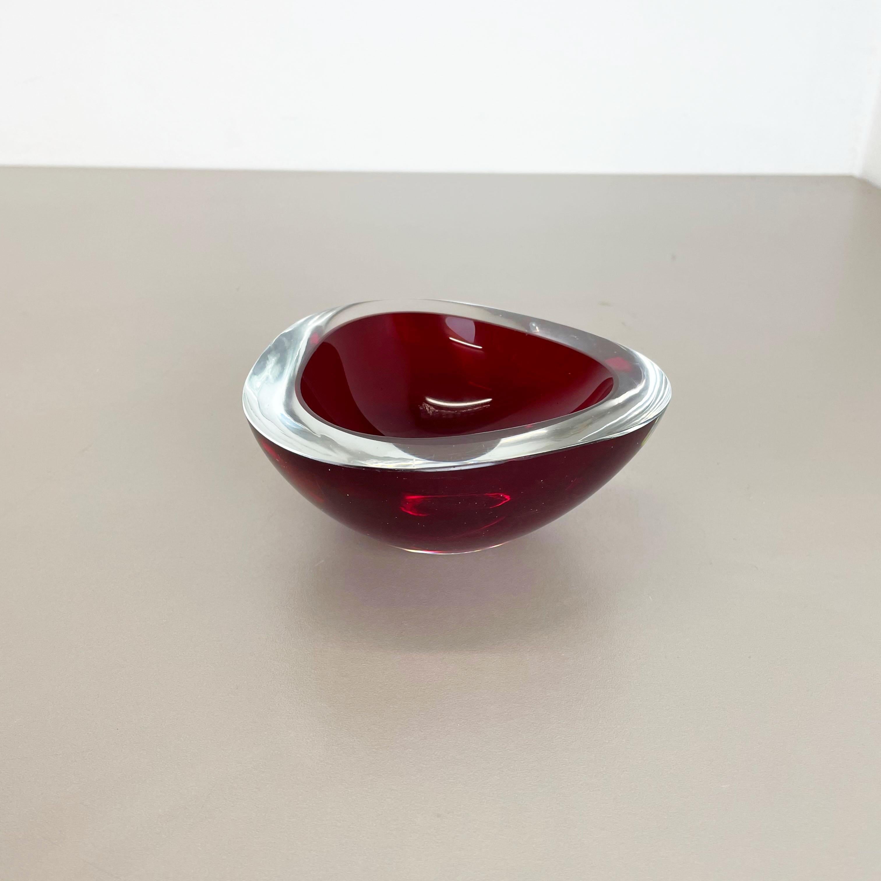 Article:

Murano glass bowl, ashtray element


Origin:

Murano, Italy


Decade:

1970s



This original vintage glass bowl element, ash tray was produced in the 1970s in Murano, Italy. It is made in Sommerso technique and has a