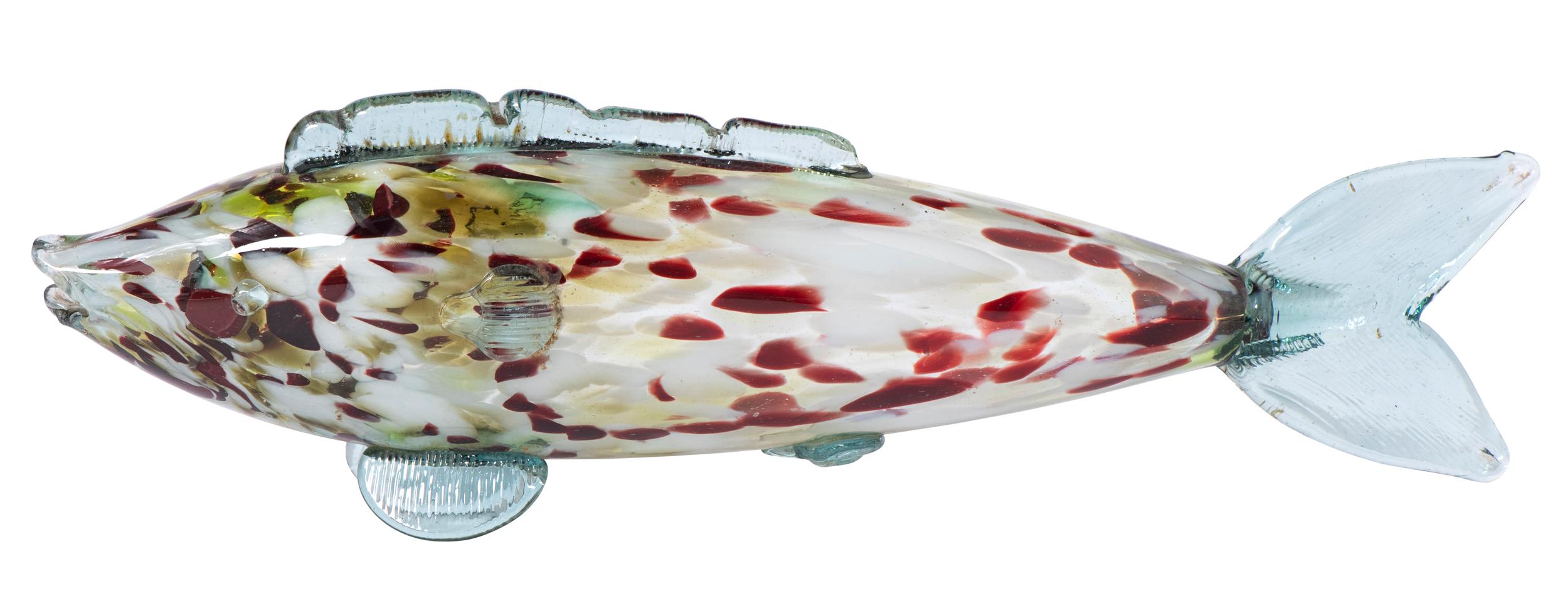 A large Murano glass fish.
Clear, white, blue and red glass.
Beautifully blown with moulded fin detail.
Italy circa 1970
Measures: 47 cm wide x 10 cm deep x 15 cm high.
