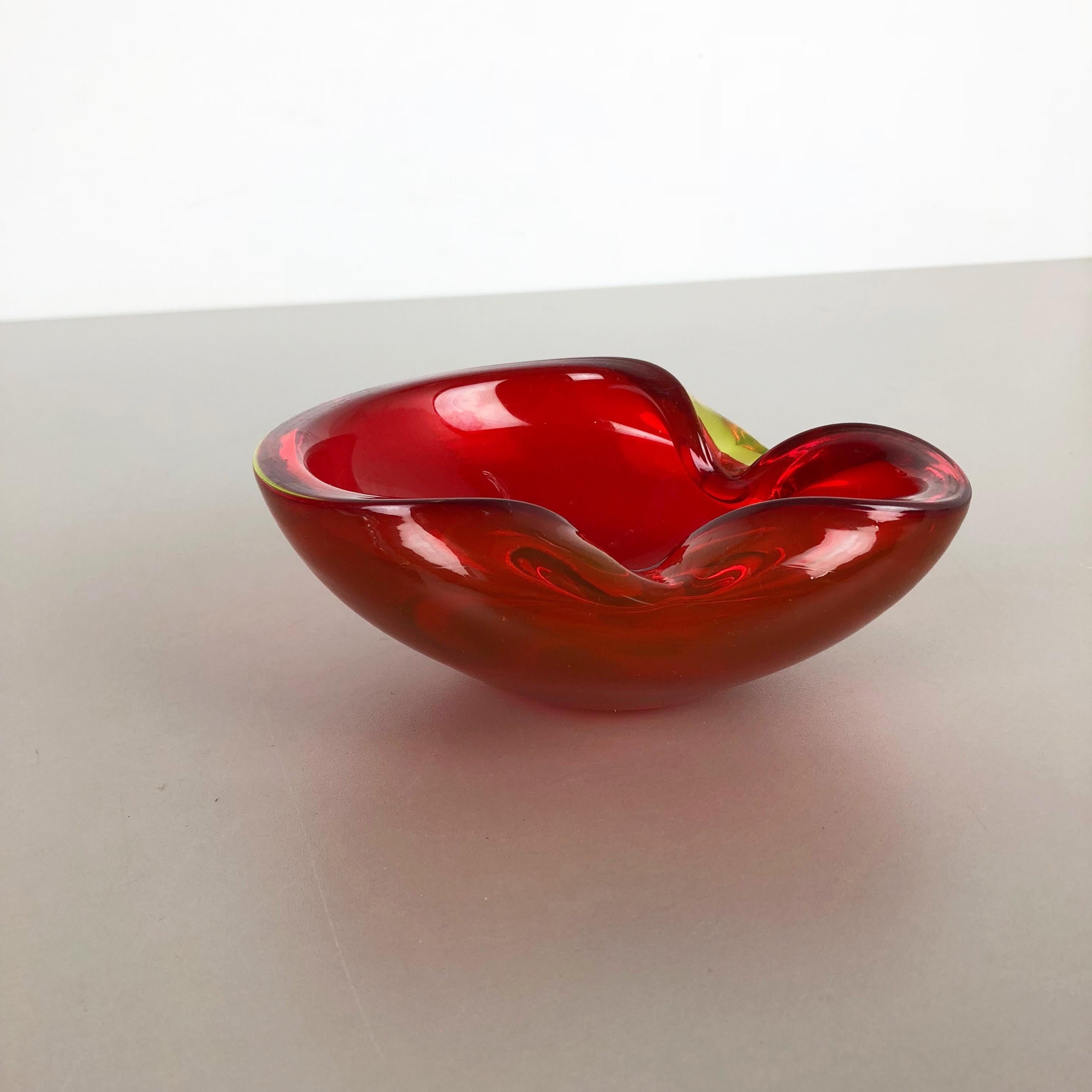 Article:

Murano glass bowl, ashtray element


Origin:

Murano, Italy


Decade:

1970s



This original vintage glass bowl element, ash tray was produced in the 1970s in Murano, Italy. It is made in Murano technique and has a