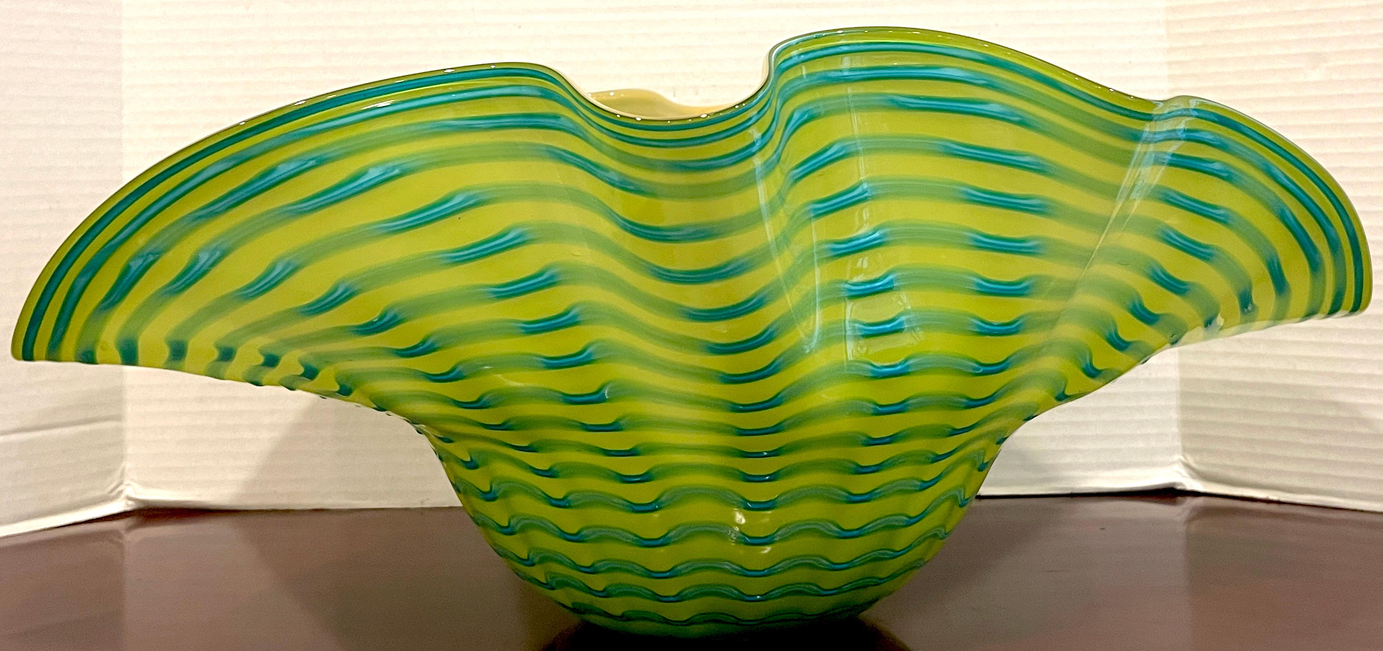 Large Murano glass seaform bowl, in the style of Chihuly
A stunning work ff large scale with seamless color transition of greens, yellow and undulating turquoise lines.
The bowl has 22-Inch Width x Varying 16.5-Inch Depth x 9-Inches High
Unsigned.