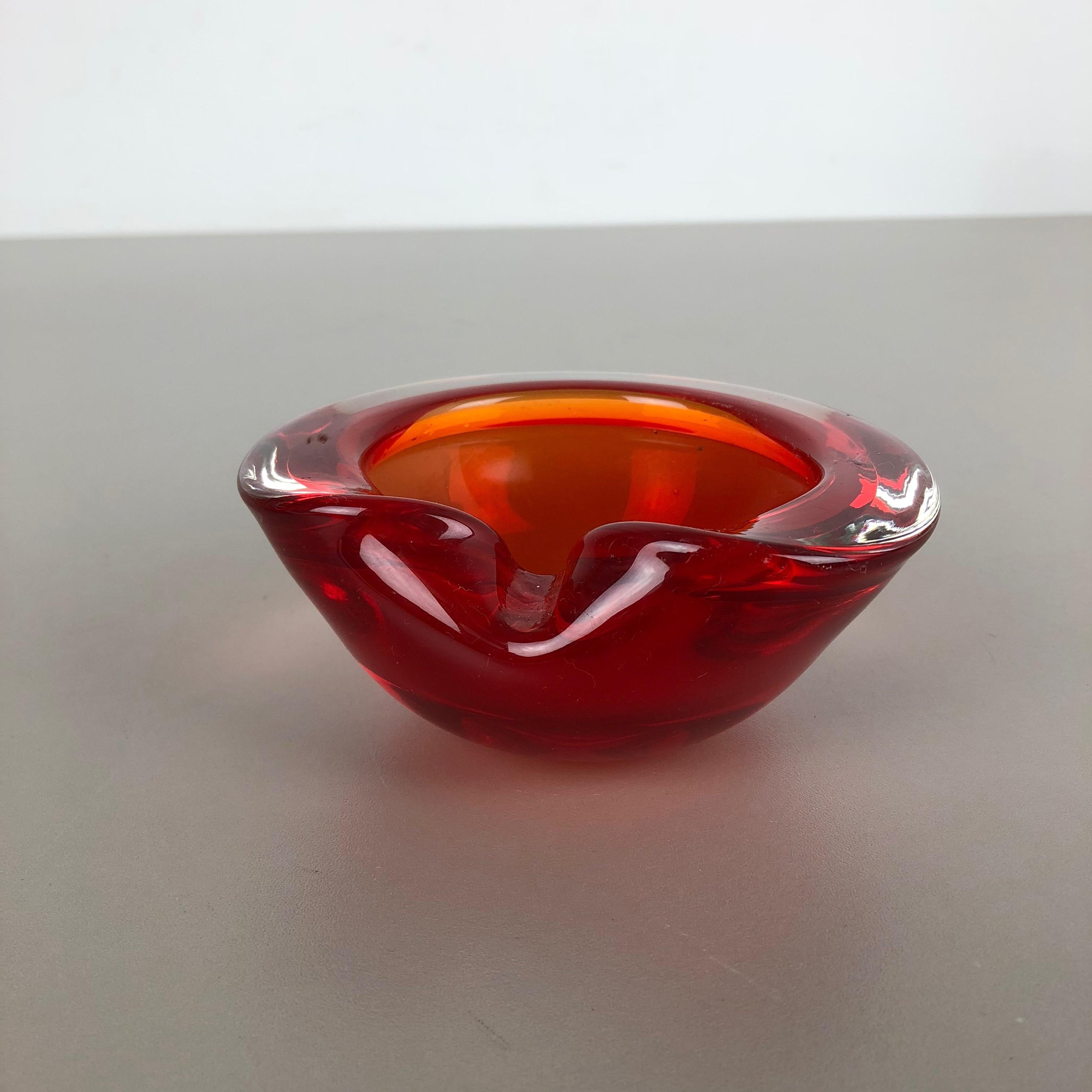 Article:

Murano glass bowl, ashtray element


Origin:

Murano, Italy


Decade:

1970s



This original vintage glass bowl element, ash tray was produced in the 1970s in Murano, Italy. It is made in Murano technique and has a