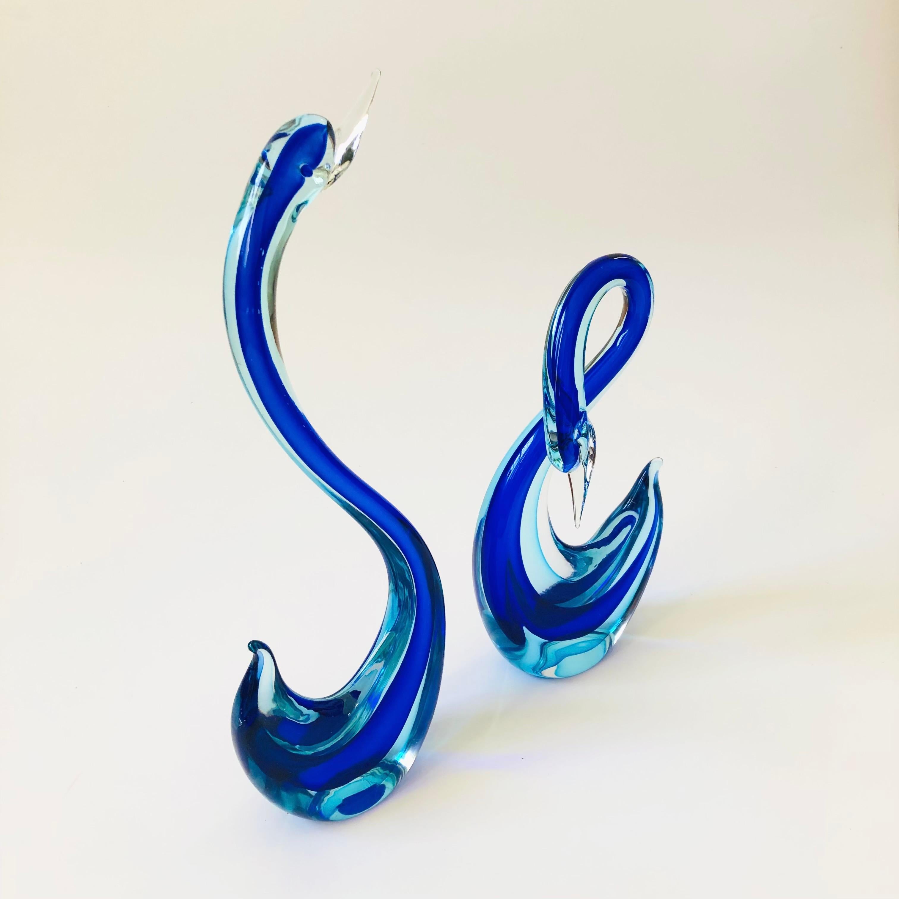 A pair of large blown glass swans by Murano. Elegant forms with a beautiful sommerso (