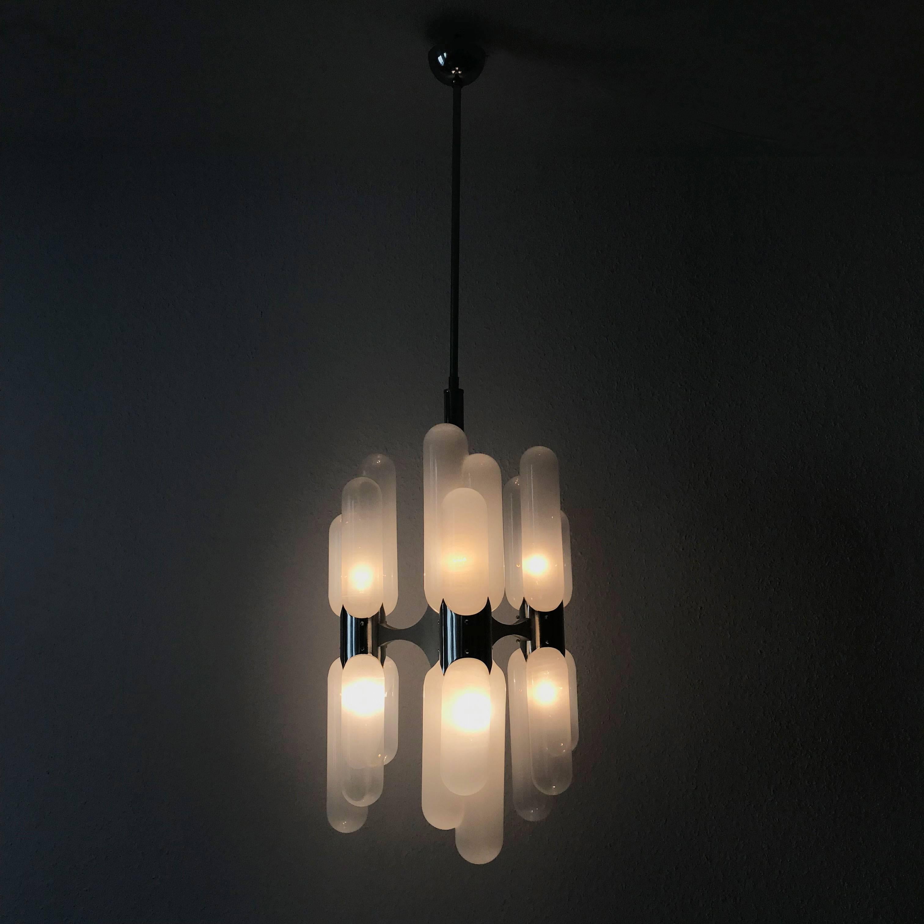 Stunning Torpedo chandelier with six handblown opaline glass shades and nickel-plated body. Designed by Carlo Nason in 1960s. Manufactured by Mazzega, Italy in 1960s. The lamp needs six E14 screw fit bulb holders.