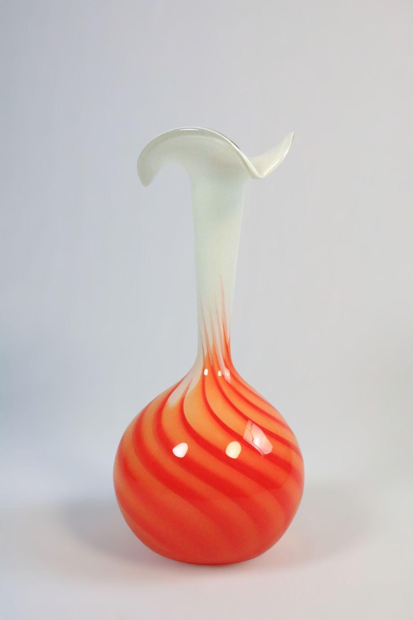 Very decorative large vase from Opaline Florence, Italy.
 
In a great swirl pattern, orange / white.
Rare in this design and from.
 
Height: 41 cm / 16.14 inches.
Diameter: 20 cm / 7.87 inches
 
In very good condition. 
