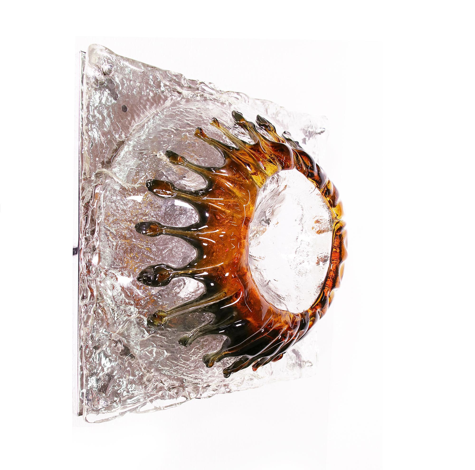 Elegant multicolor 'Volcane' wall sconce and ceiling light made of handblown Murano glass with clear and amber tones on a chromed frame. Designed by Tony Zuccheri for Venini, Italy in the 1960s. 

Measures: width 15.7