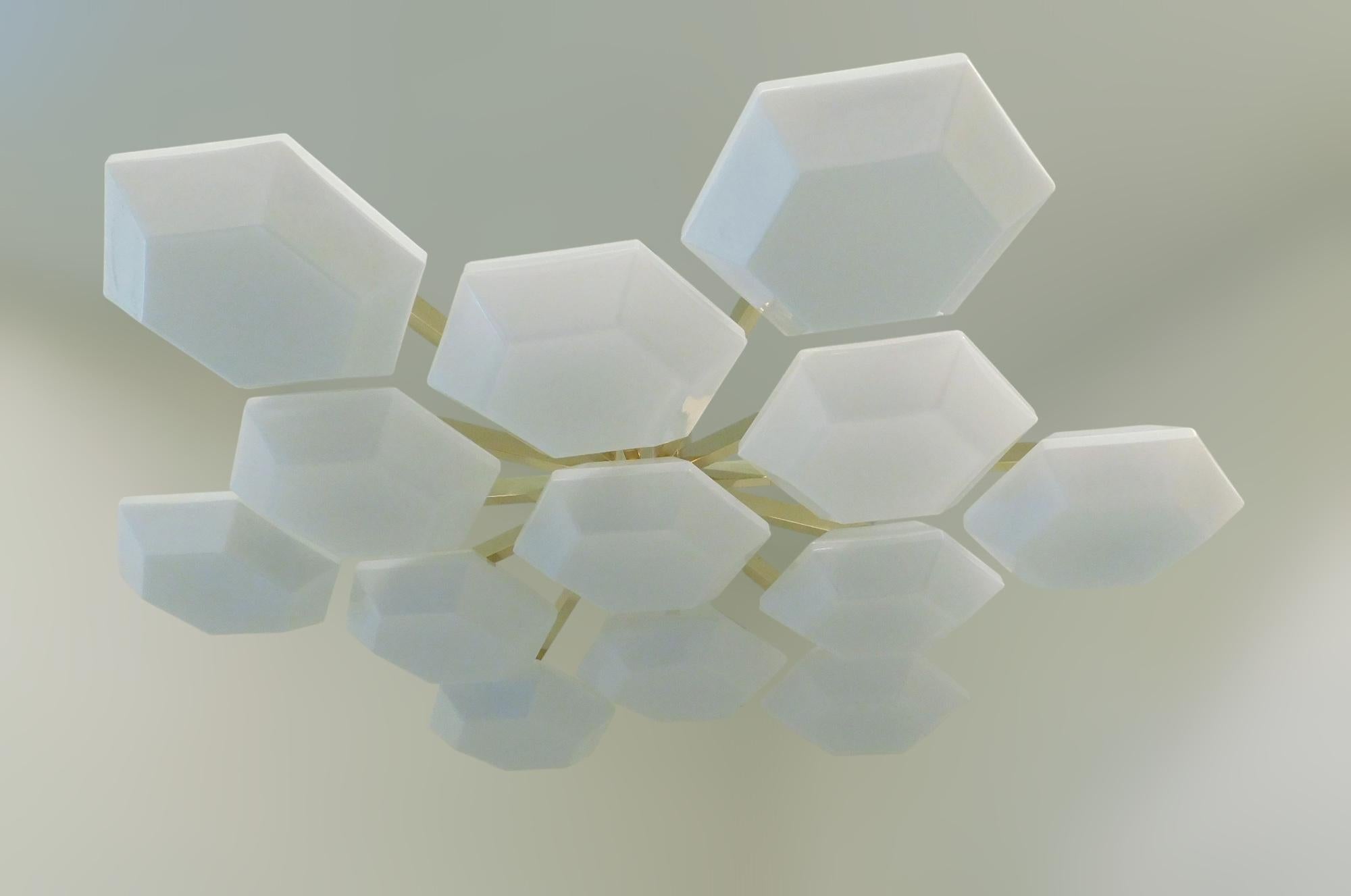 Italian flush mount with large white hexagonal Murano glass shades mounted on brass frame / Made in Italy
Measures: Diameter 47 inches, height 10 inches
13 light / G9 type / max 40W each
2 available in stock in Italy, price listed is for each