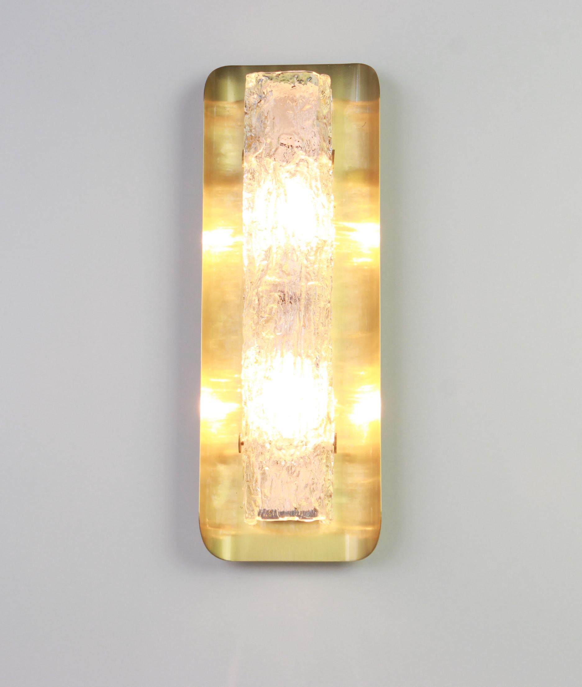 Gorgeous glass sconces with brass holders by Hillebrand Leuchten, Germany, circa 1970s.
High quality and in very good condition. Cleaned, well-wired and ready to use.
The sconce requires 2 x E14 standard bulbs with 40W max each and compatible with