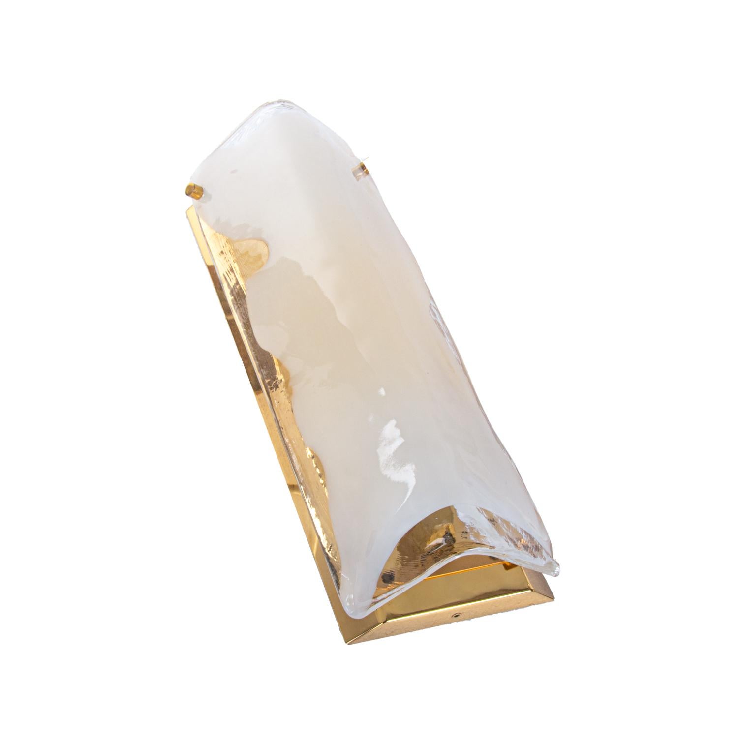 Large elegant Kalmar wall sconce made of handblown clear and white Murano glass mounted on gold plated back plates. Made in Austria in the 1960s. 

Design: Carlo Nason attr. 
Maker: J.T. Kalmar, labeled. 
Measures: Height 15.75“ in. (40 cm), width