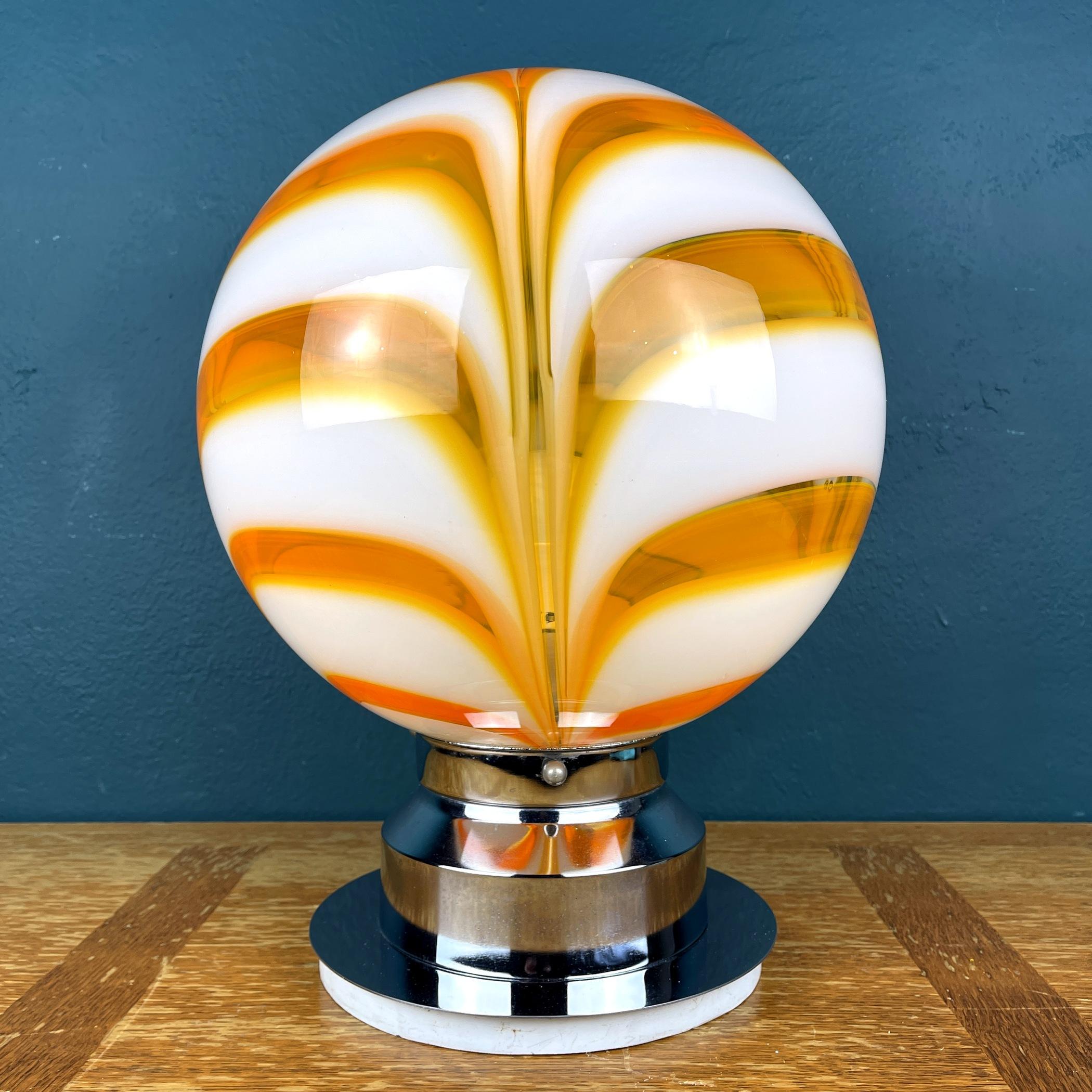 The very beautiful large swirl orange Murano glass table lamp made in Italy in the 80s.
Excellent vintage condition.
One E27 bulb is required. The wiring is original and has a European plug. Cable length 280 cm.
Mid-century swirl Murano lamp