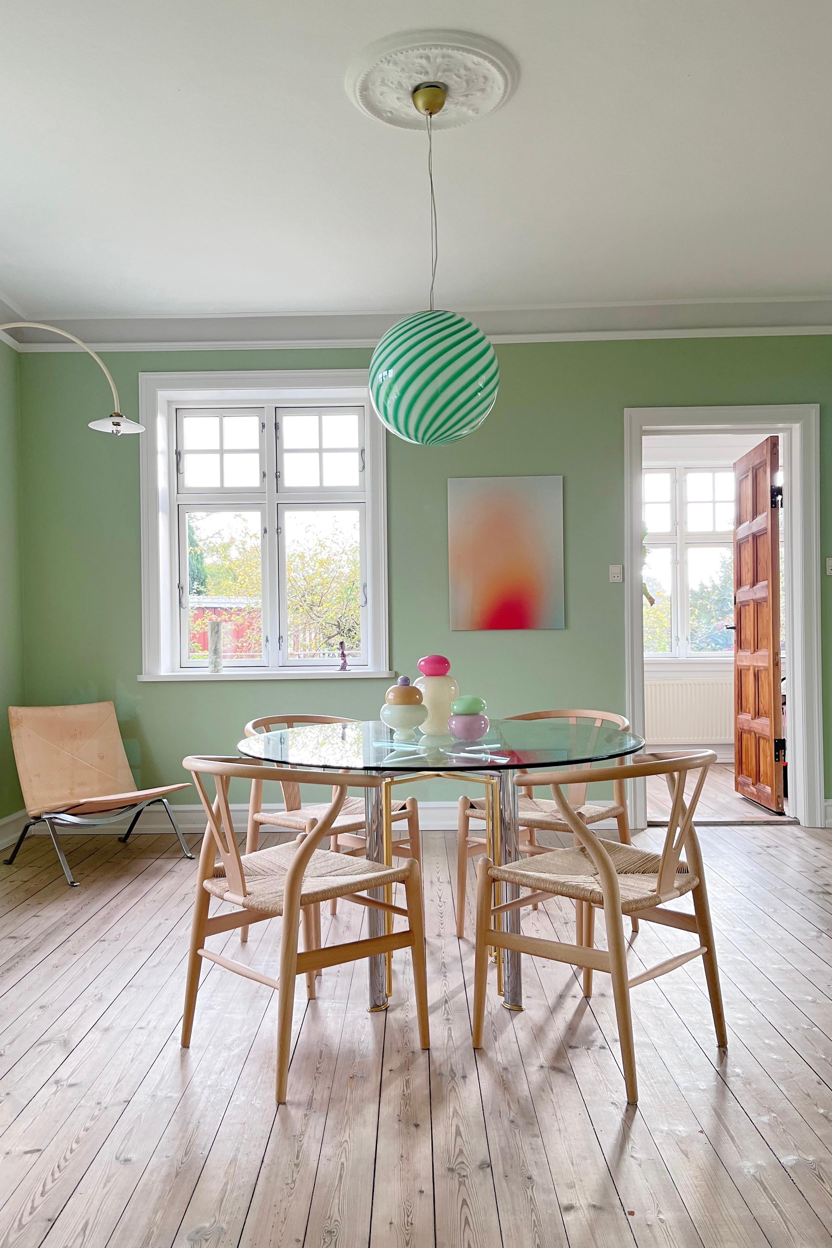 Medium Murano Vintage Candy pendant ceiling lamp in green / white glass. Mouth-blown glass in round shape with swirl pattern. E27 socket. Comes with adjustable suspension. 
Handmade in Italy.
D:40 cm  

As it is mouth blown glass, the expression