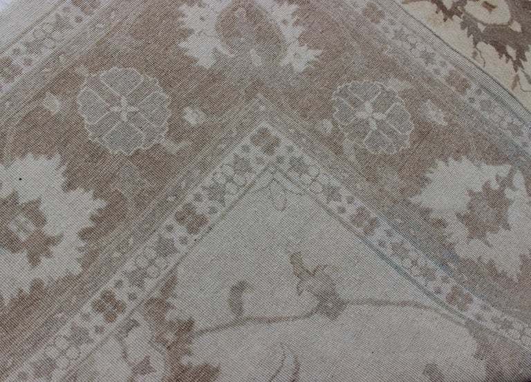 Afghan Rug in Muted Earthy Tones of Brown and Cream For Sale at 1stDibs