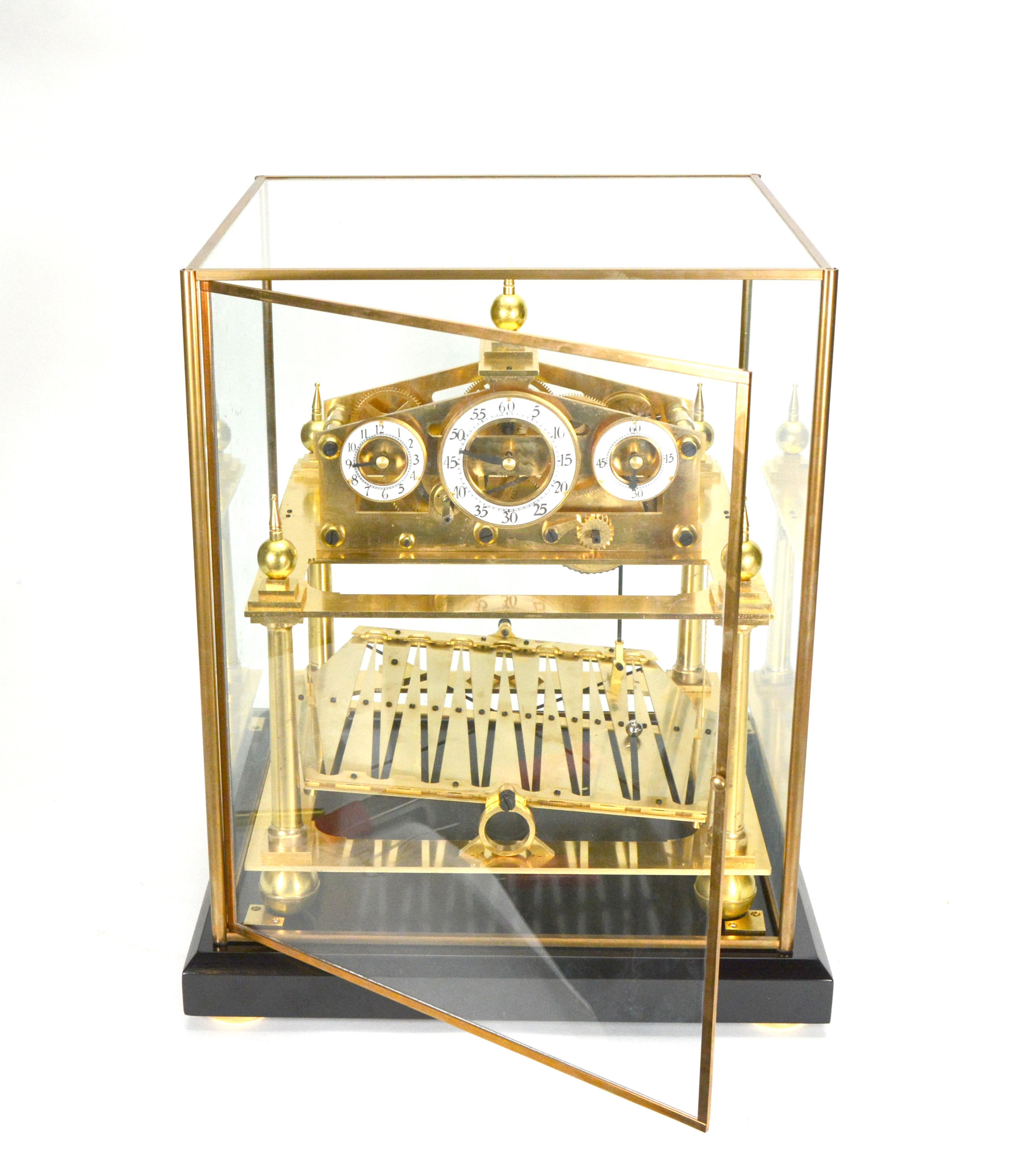  Mystery 8 DAY Fusee Chain English Congreve Rolling Ball Clock

Here is a beautiful mystery Congreve rolling ball clock. The original clock is invented by an English - Sir W. Congreve in 1808. This one comes with a matching display stand and